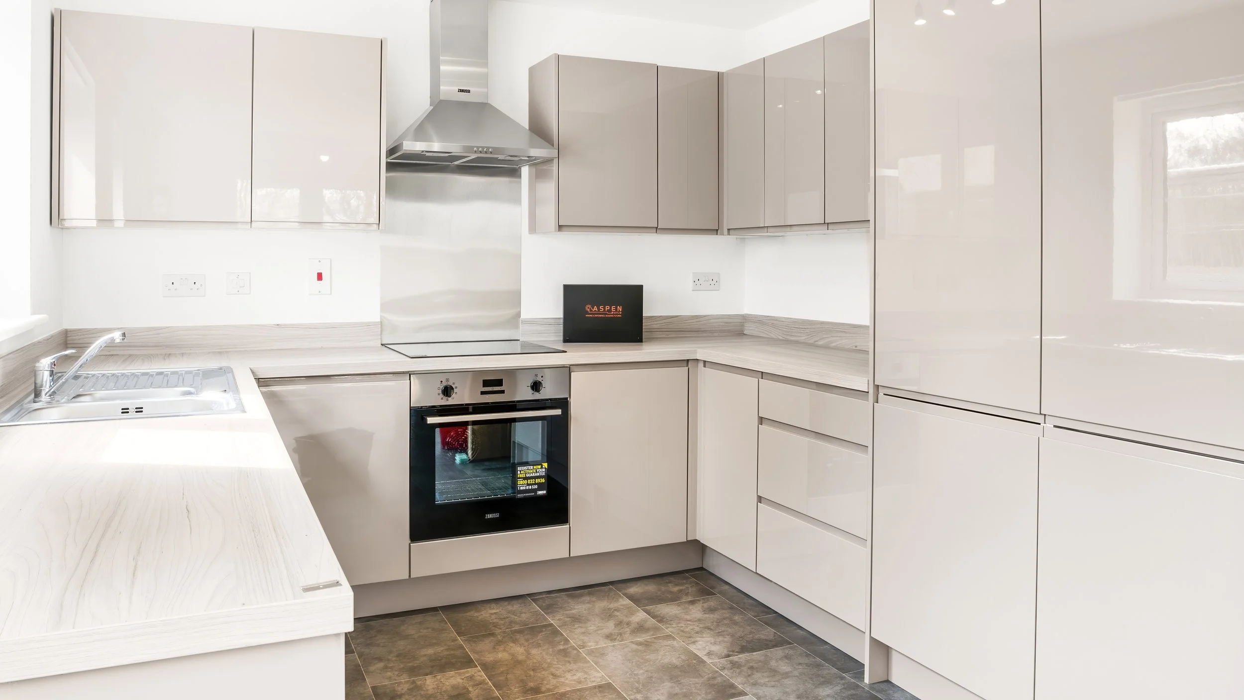White fitted kitchen inside a Great Staughton home