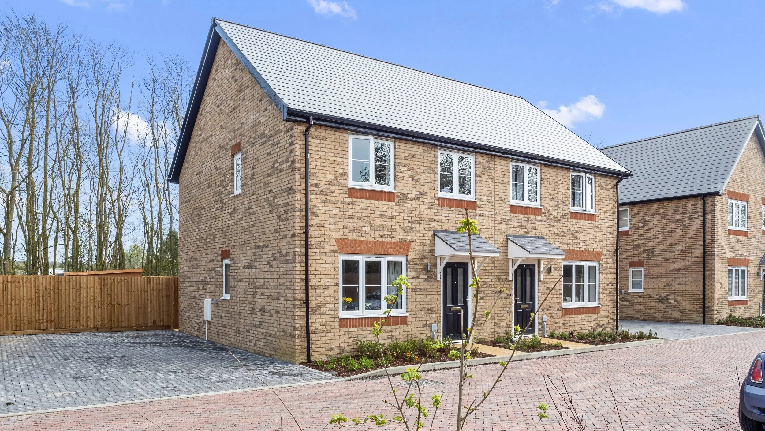 Rear view of homes and fenced gardens at Great Staughton