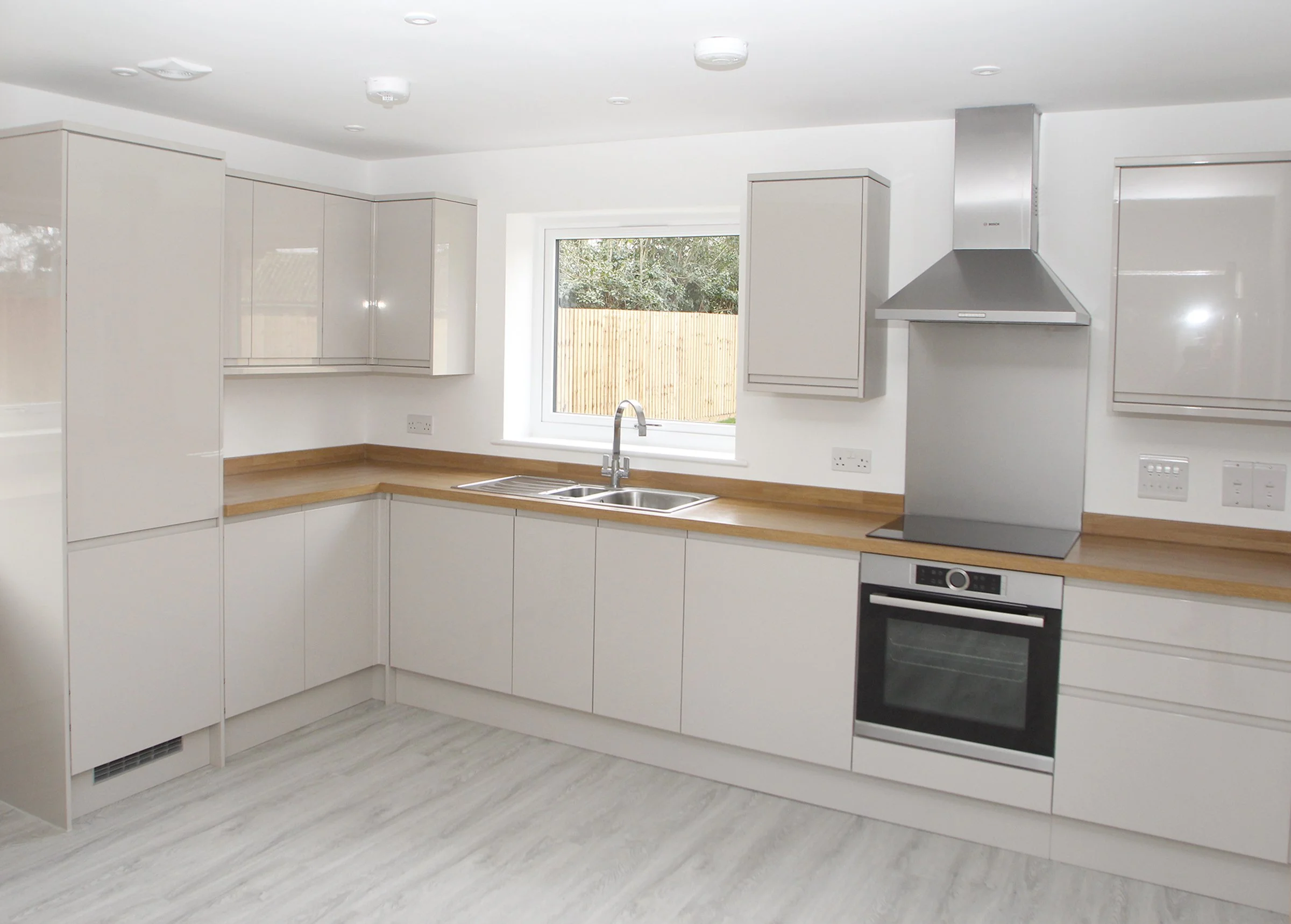 Grey fitted kitchen inside a Needingworth home