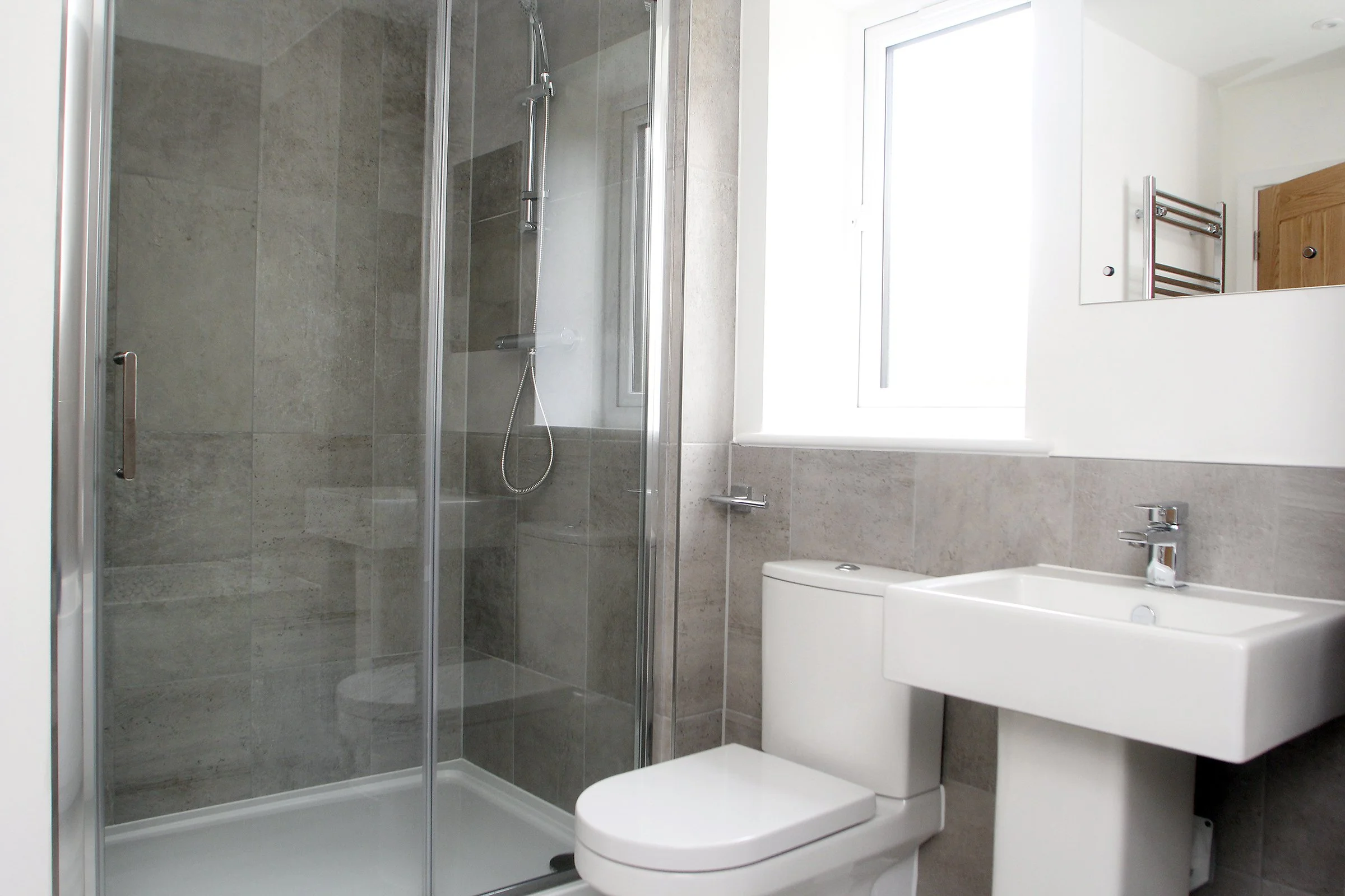 Bathroom with shower and basin at Needingworth