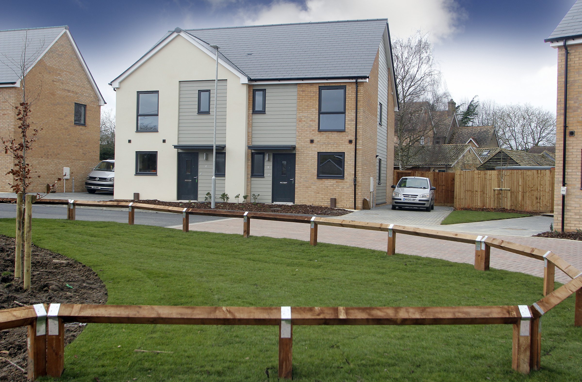 Homes arranged around the landscaped green at Needingworth