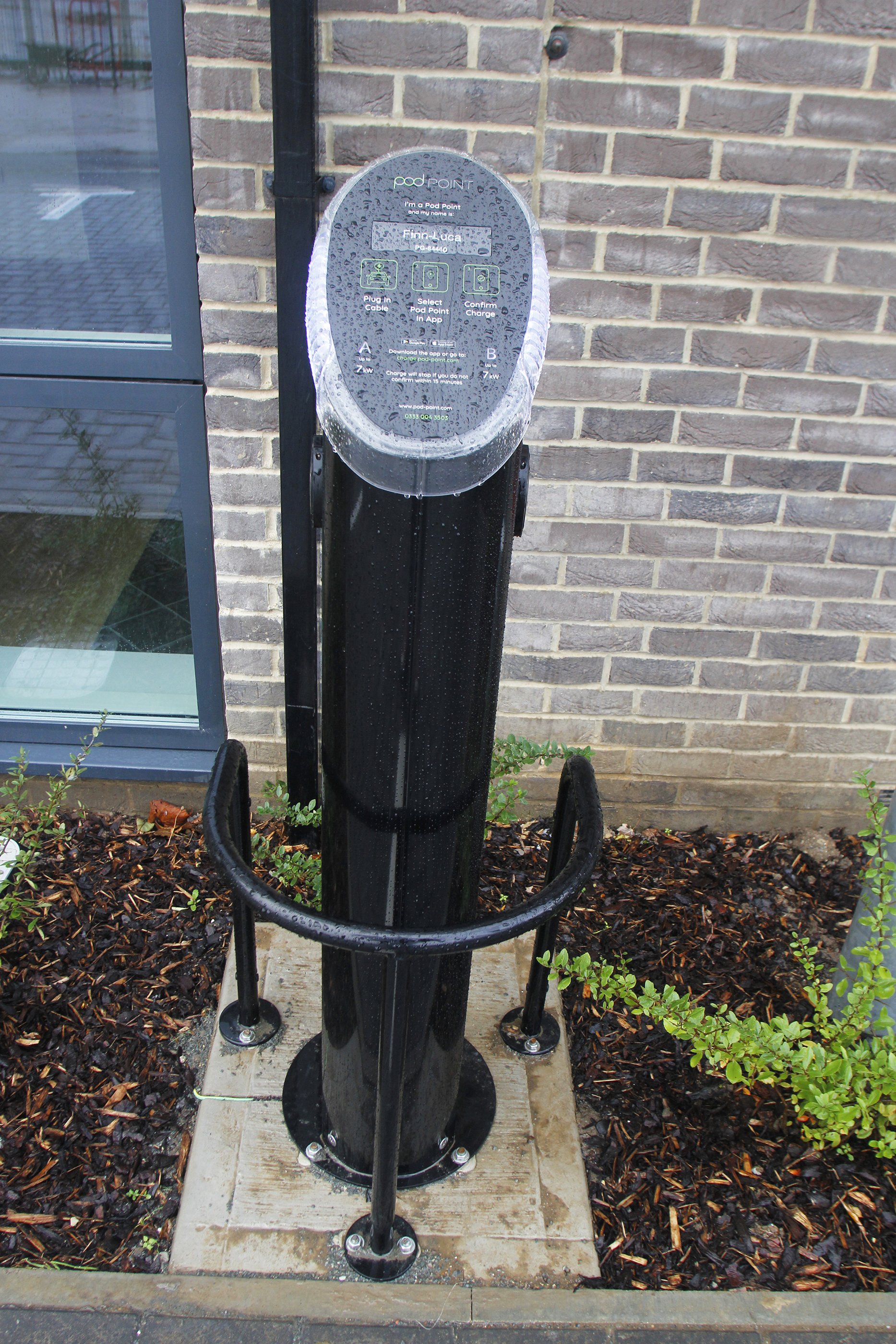 Electric vehicle charging point beside Antler House