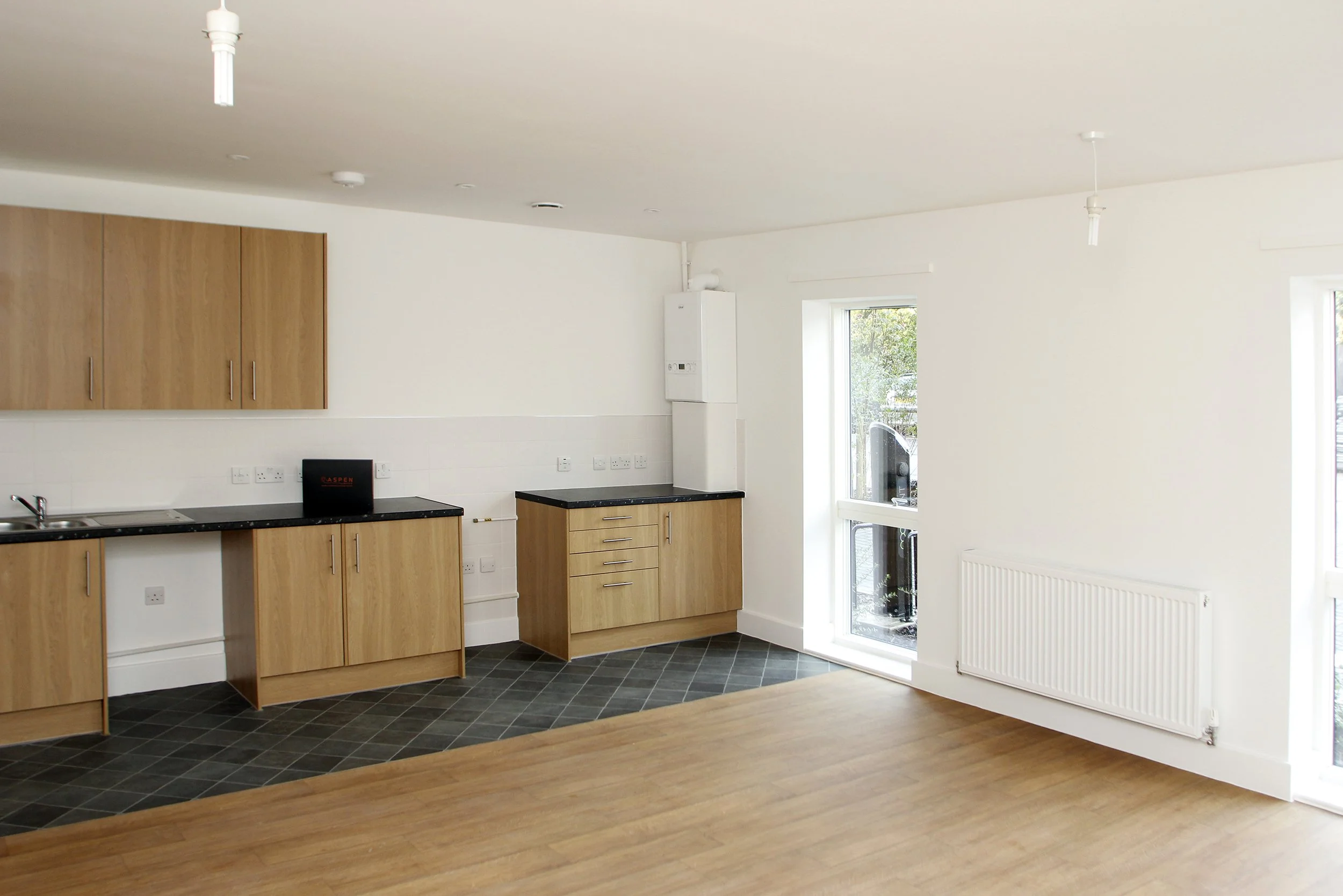 Open-plan kitchen and living area inside an Antler House apartment