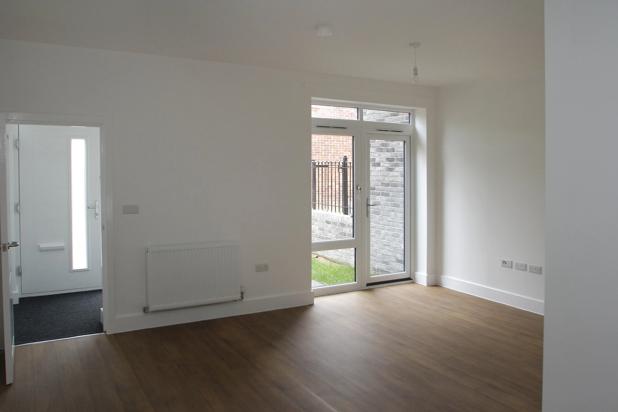 Bright living and dining room inside a Wessex Close home