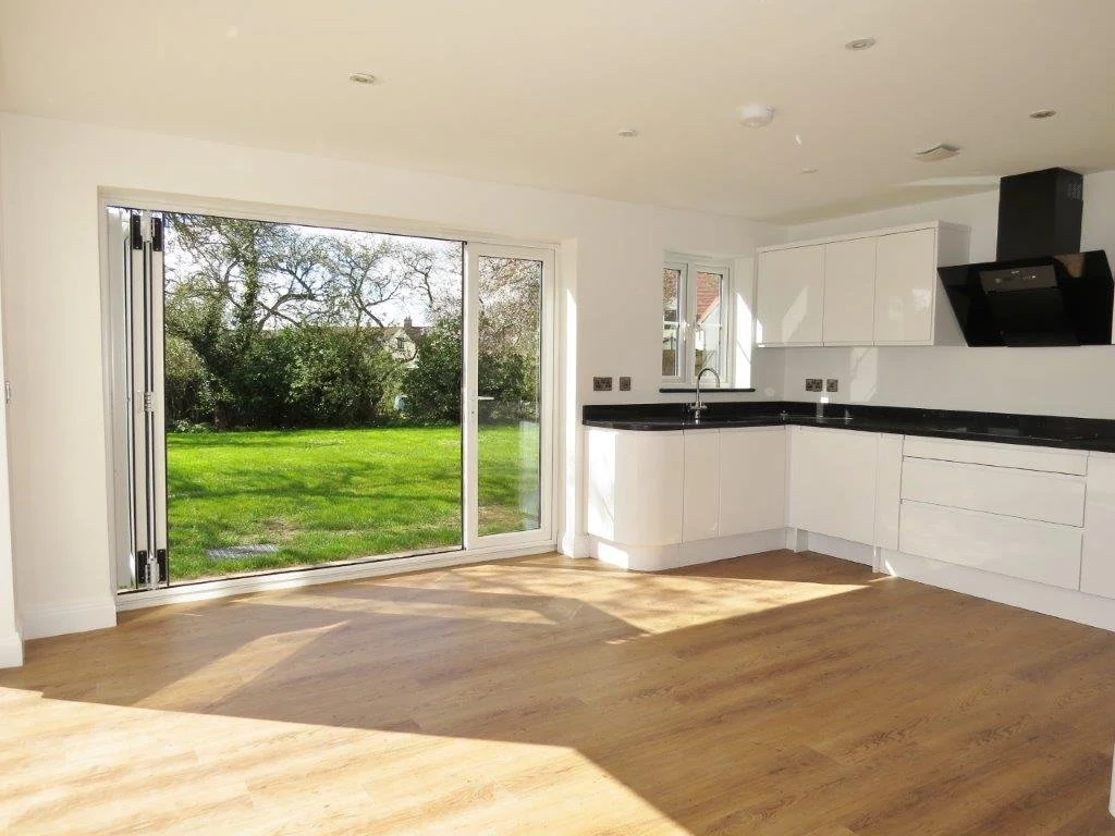 Kitchen and dining area overlooking the garden at Edward Marks Drive