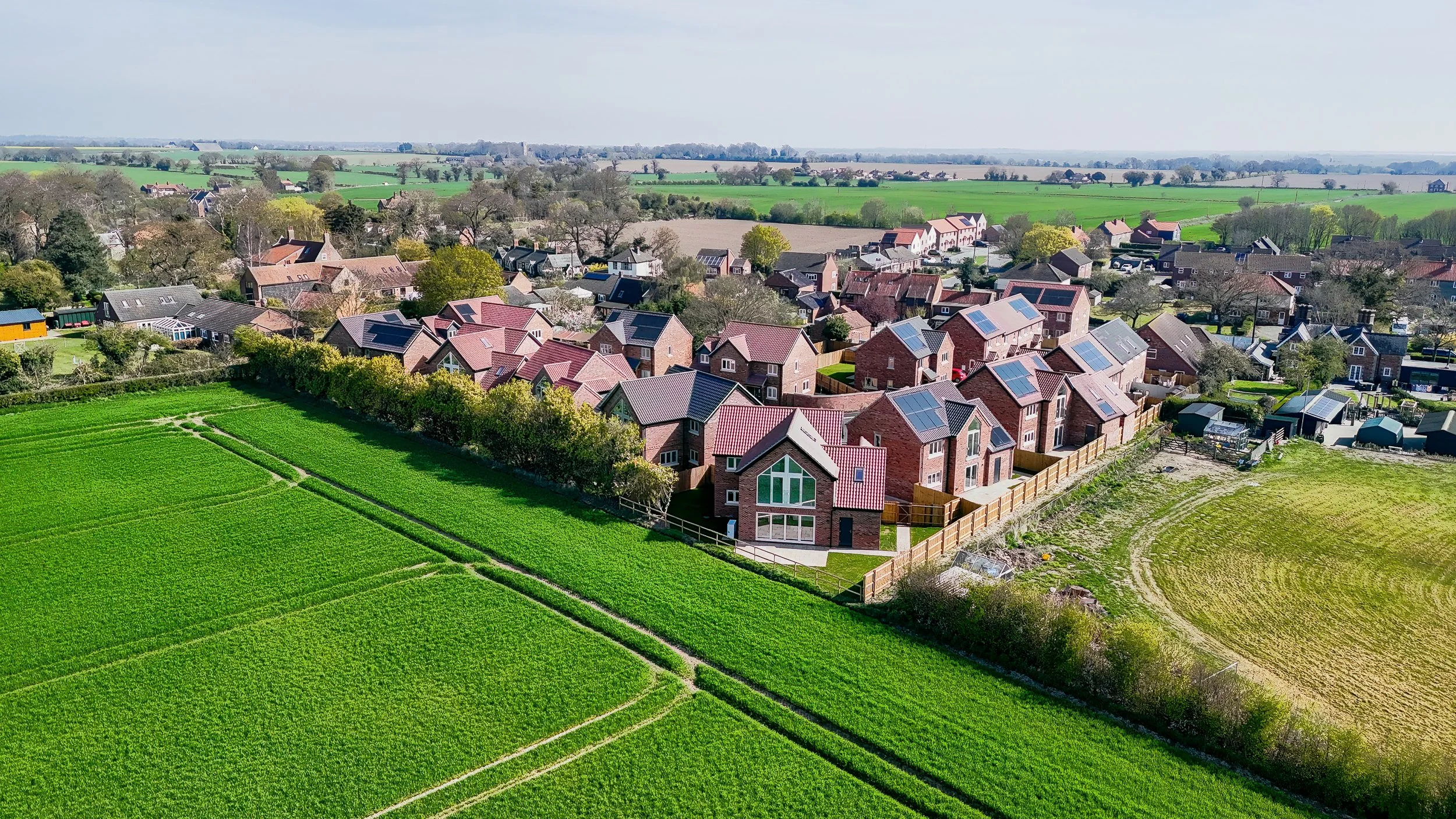 Aerial view of The Green beside surrounding fields in Freethorpe