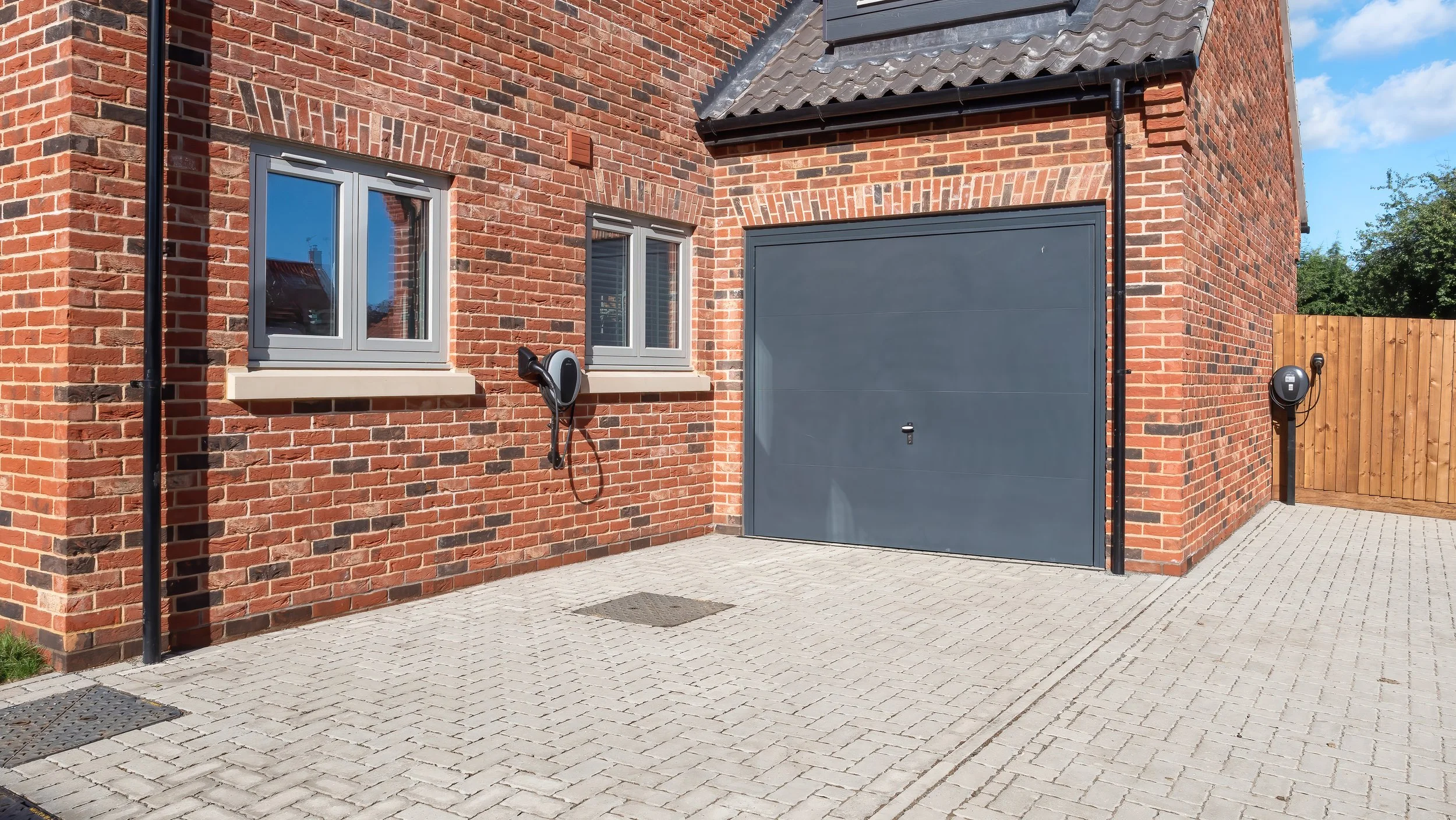 Paved driveway and garage at The Green