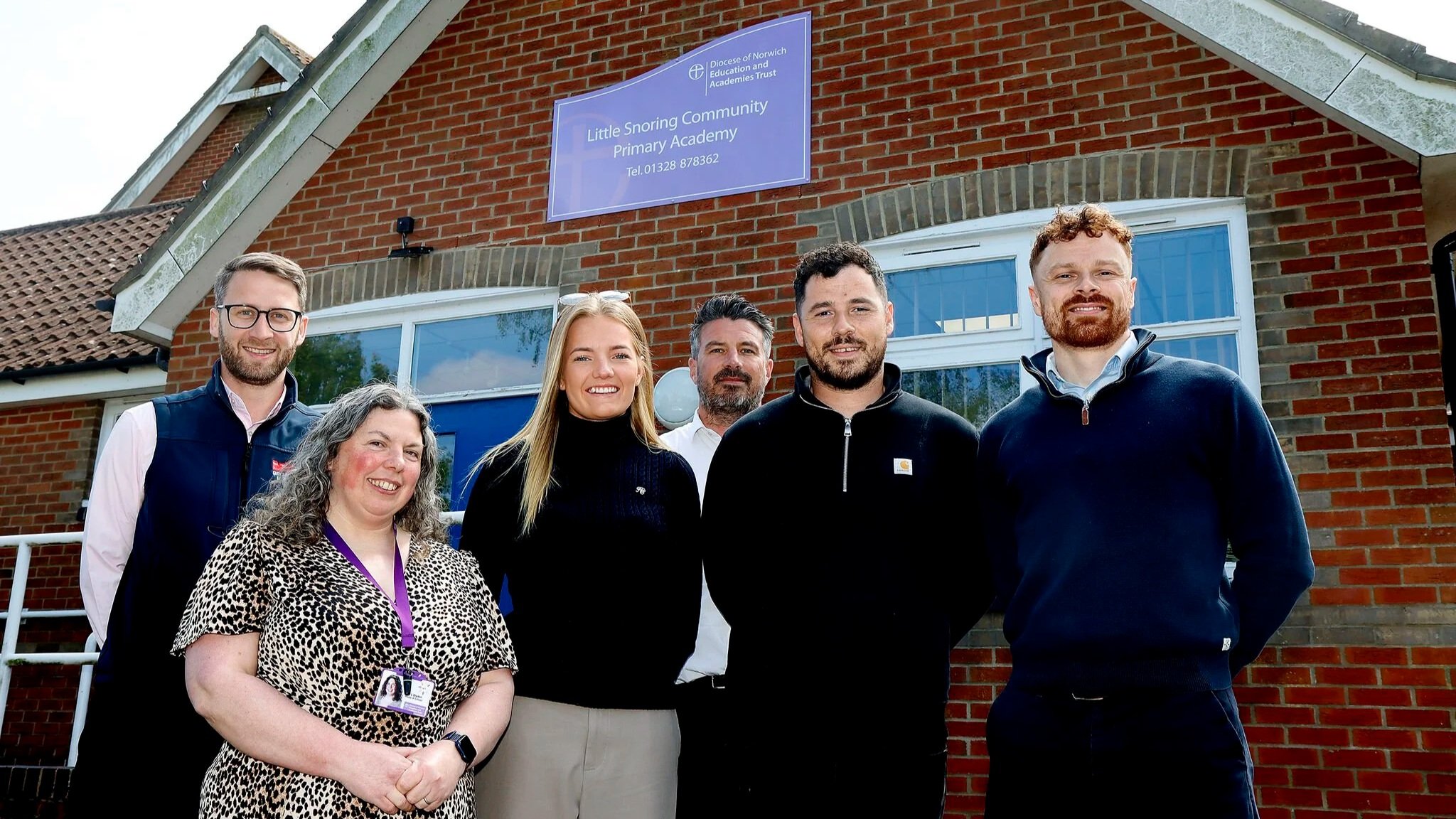 Aspen Build and Broadland Housing partners outside Little Snoring Primary School