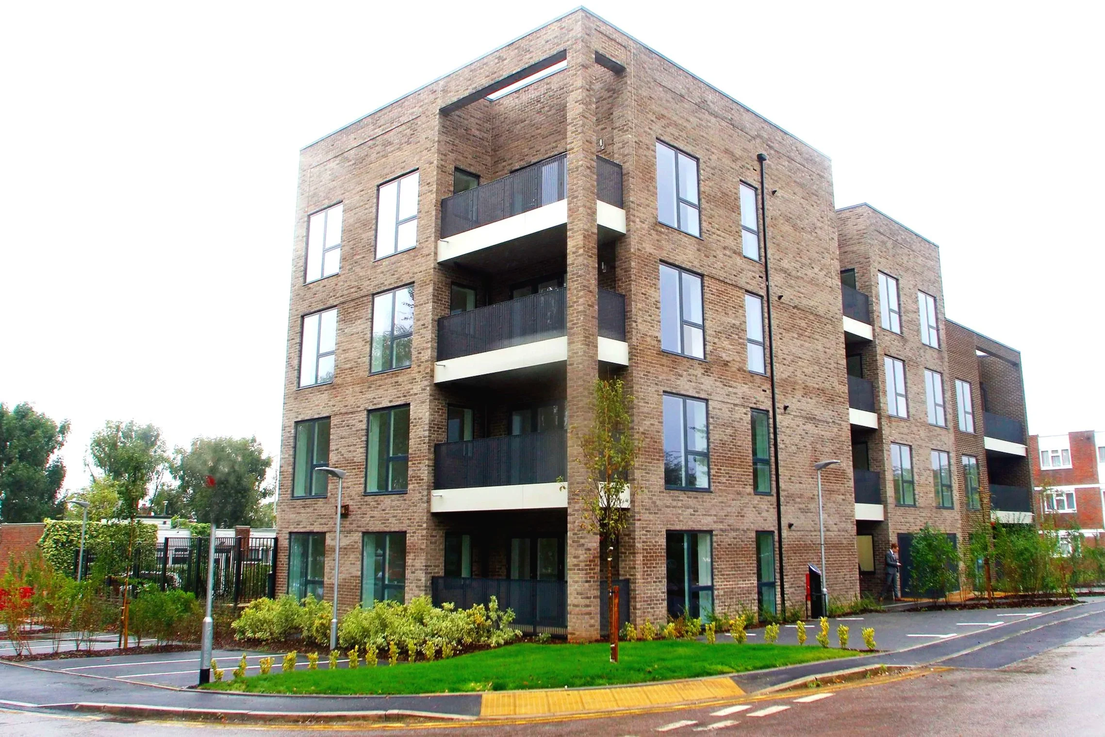 Antler House red-brick apartment building with recessed balconies in Hainault