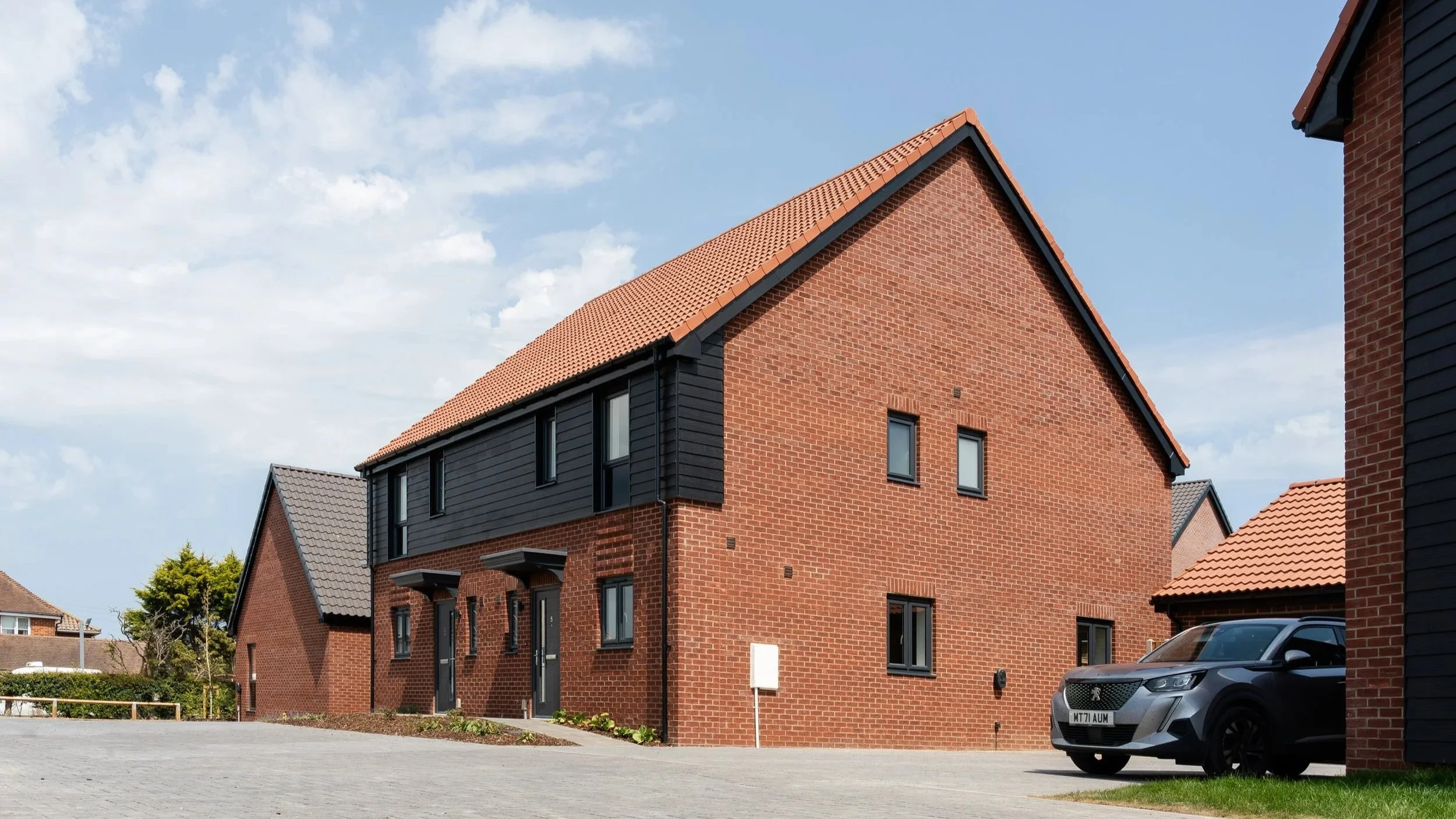 Completed red-brick affordable homes at the Bacton development