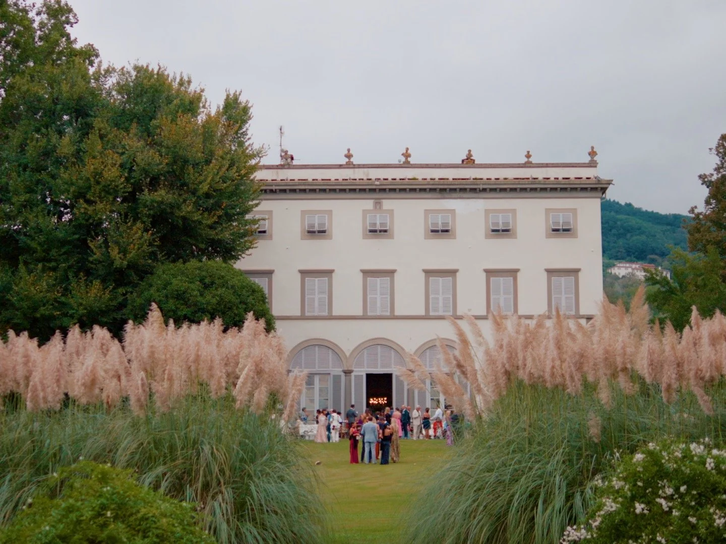 villa grabau, tuscany italy venue outside at cocktail hour on a wedding day