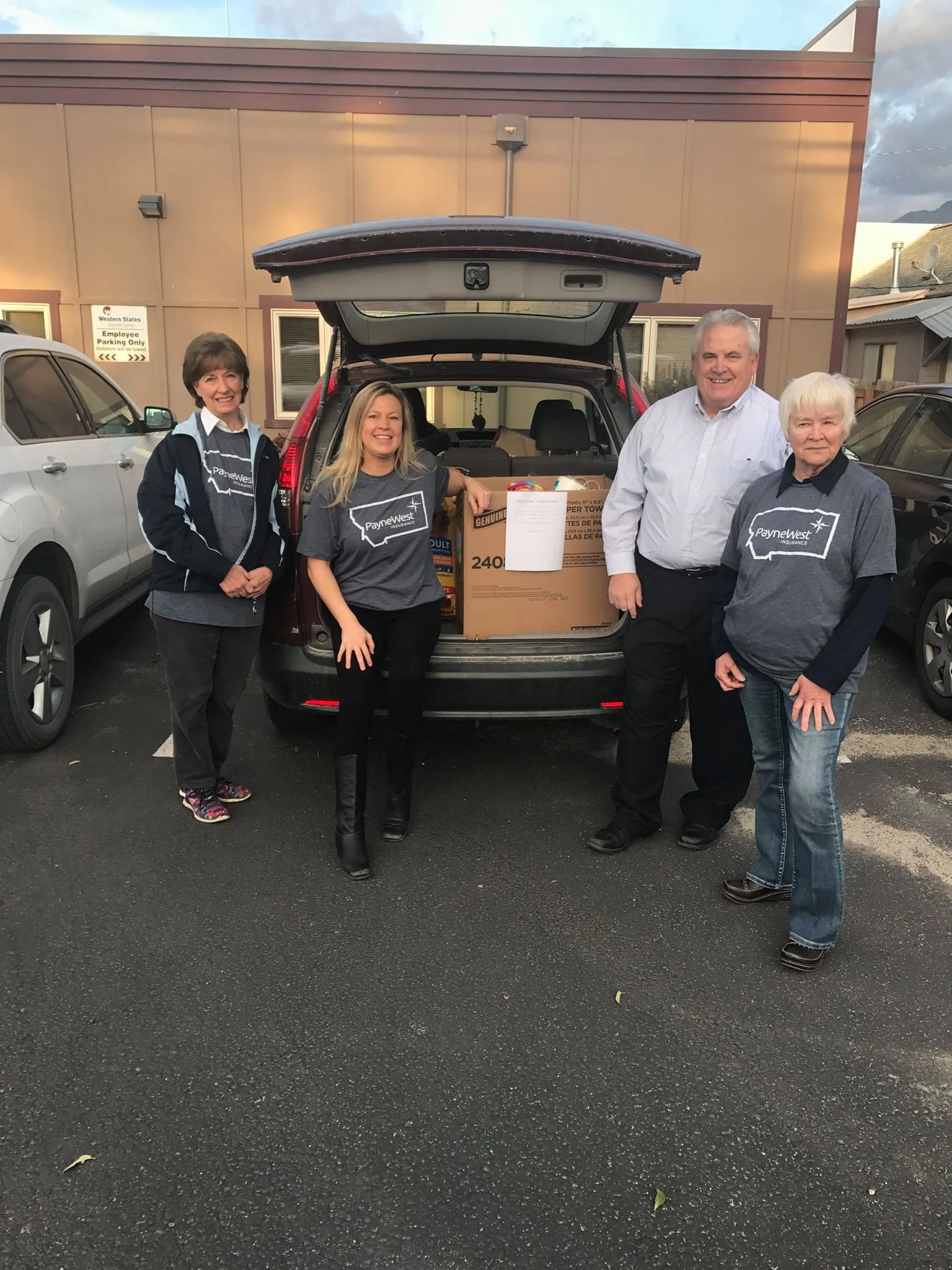 Volunteers dropping off donations at Pantry Partners Food Bank