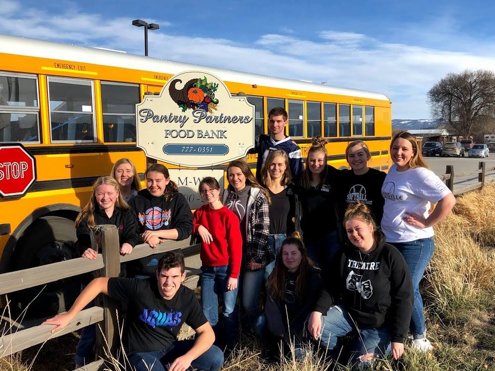 School group dropping off donations to Pantry Partners Food Bank