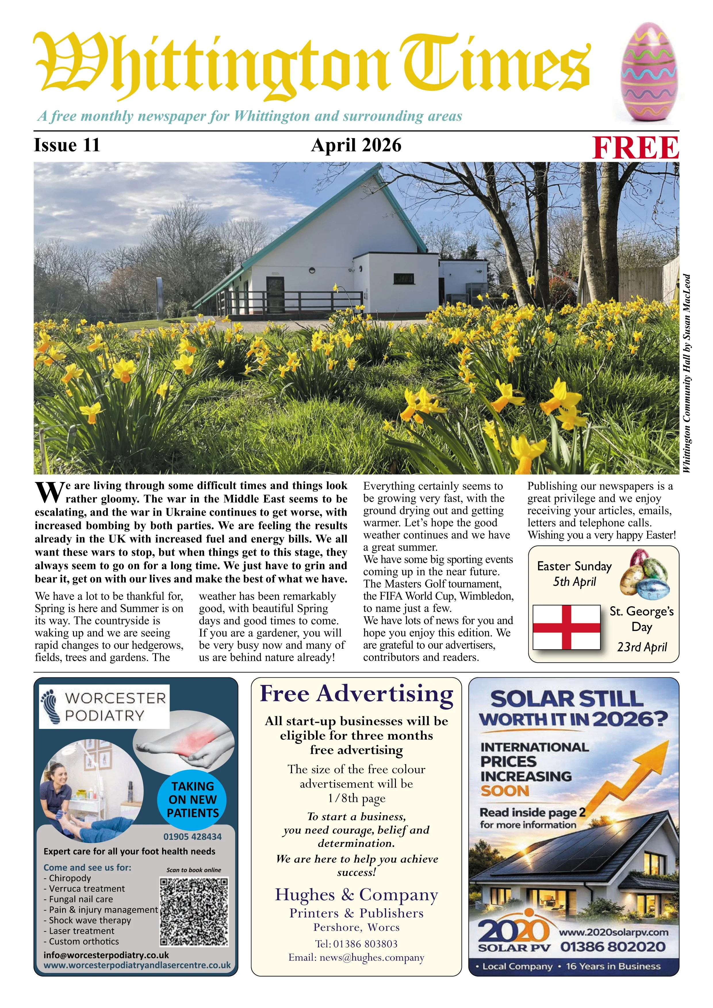 Front page of the Whitlington Times newspaper for April 2026, Issue 11, featuring a landscape with yellow flowers, trees, a modern white building with a green roof, and a partly cloudy sky.