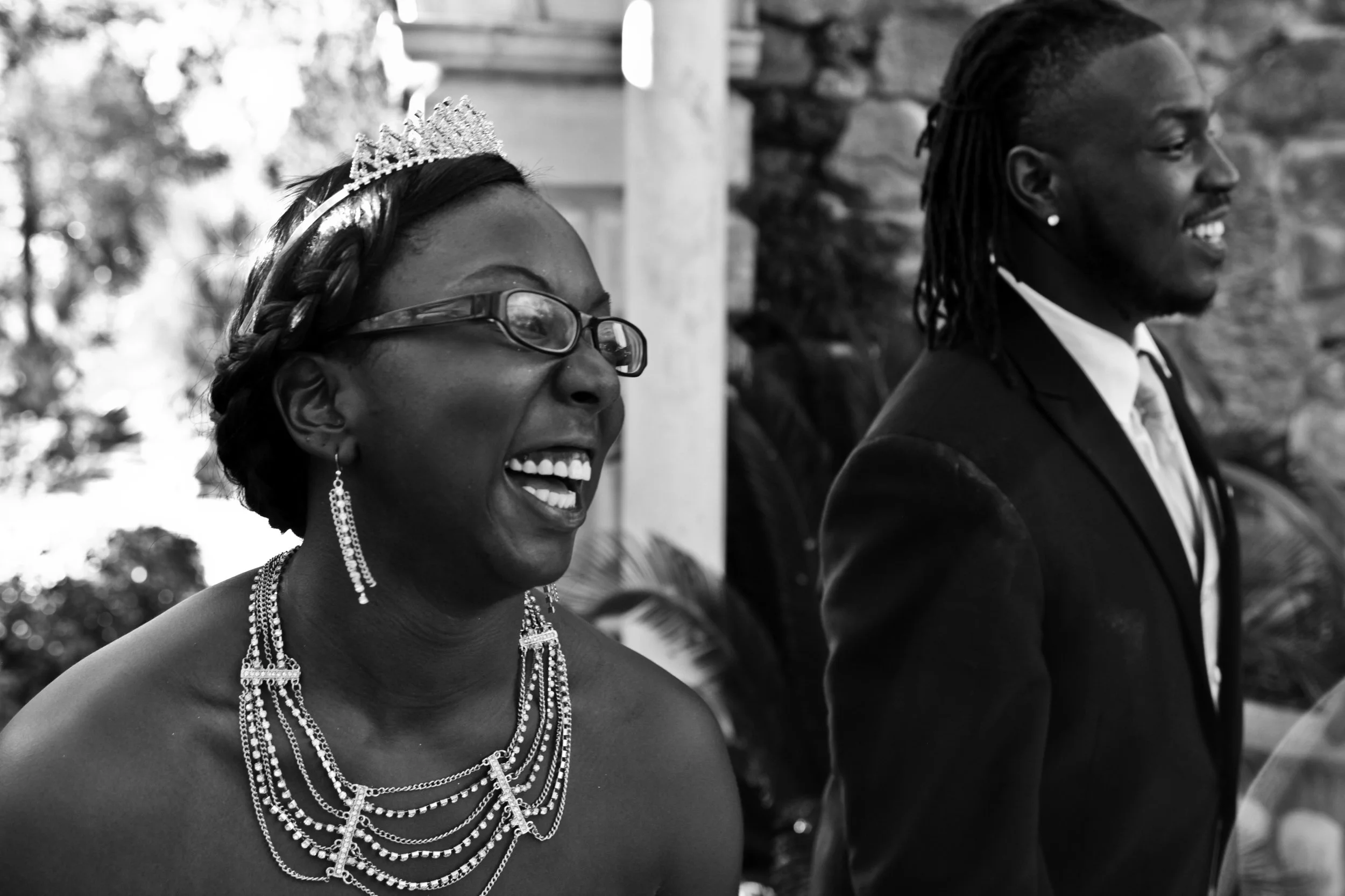 A candid portrait of the bride laughing during the wedding celebration. This authentic moment reflects the storytelling approach and emotional style of Caerus Multimedia wedding photography in Austin, Texas.