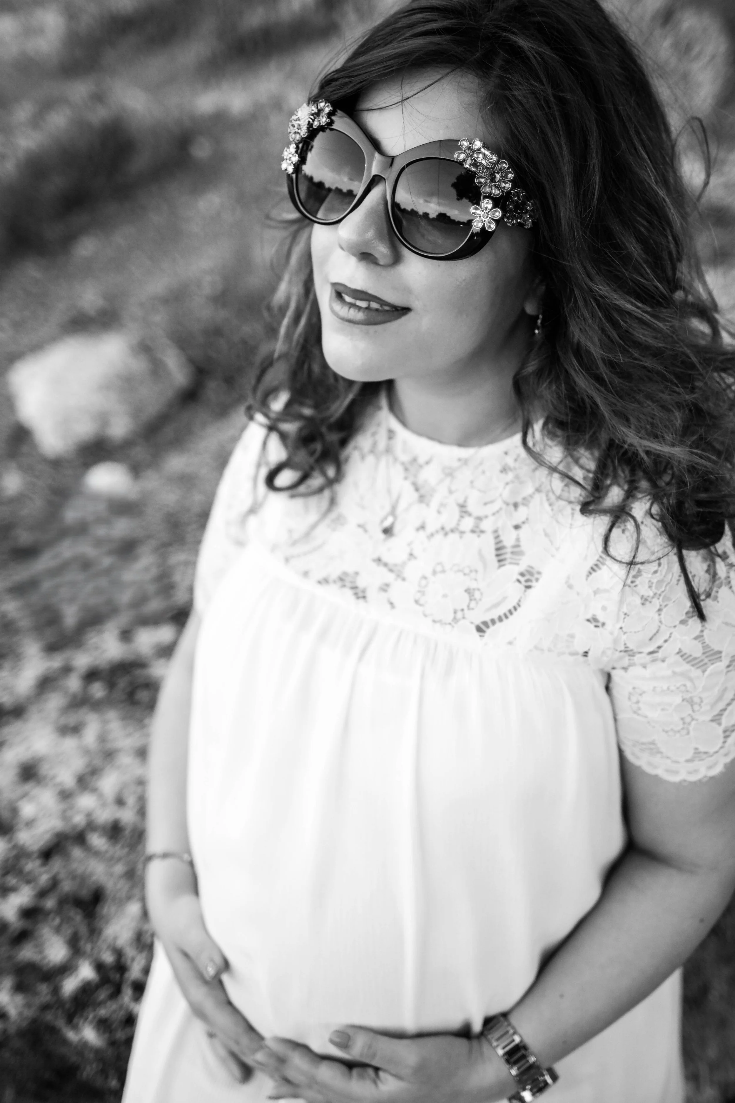 Elegant black and white maternity portrait of an expecting mother during a pregnancy photography session in Austin, Texas captured by Caerus Multimedia, an Austin maternity photographer specializing in natural maternity portraits.