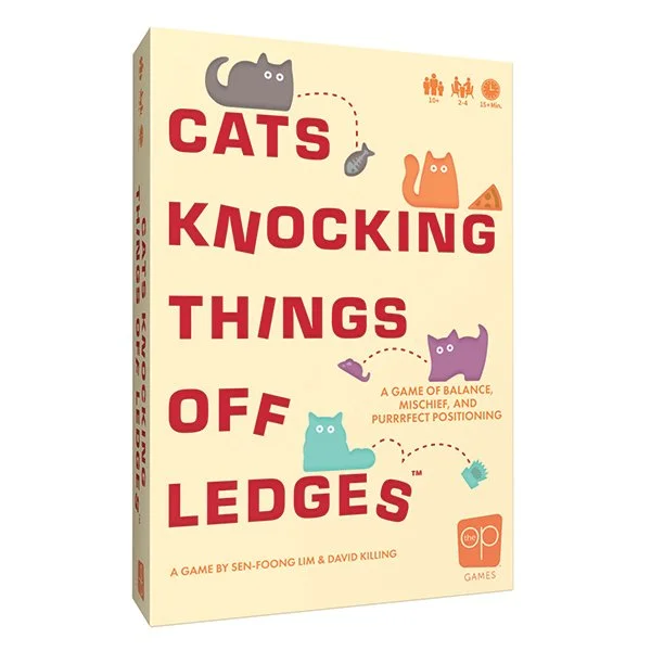 cats knocking things off ledges.jpg