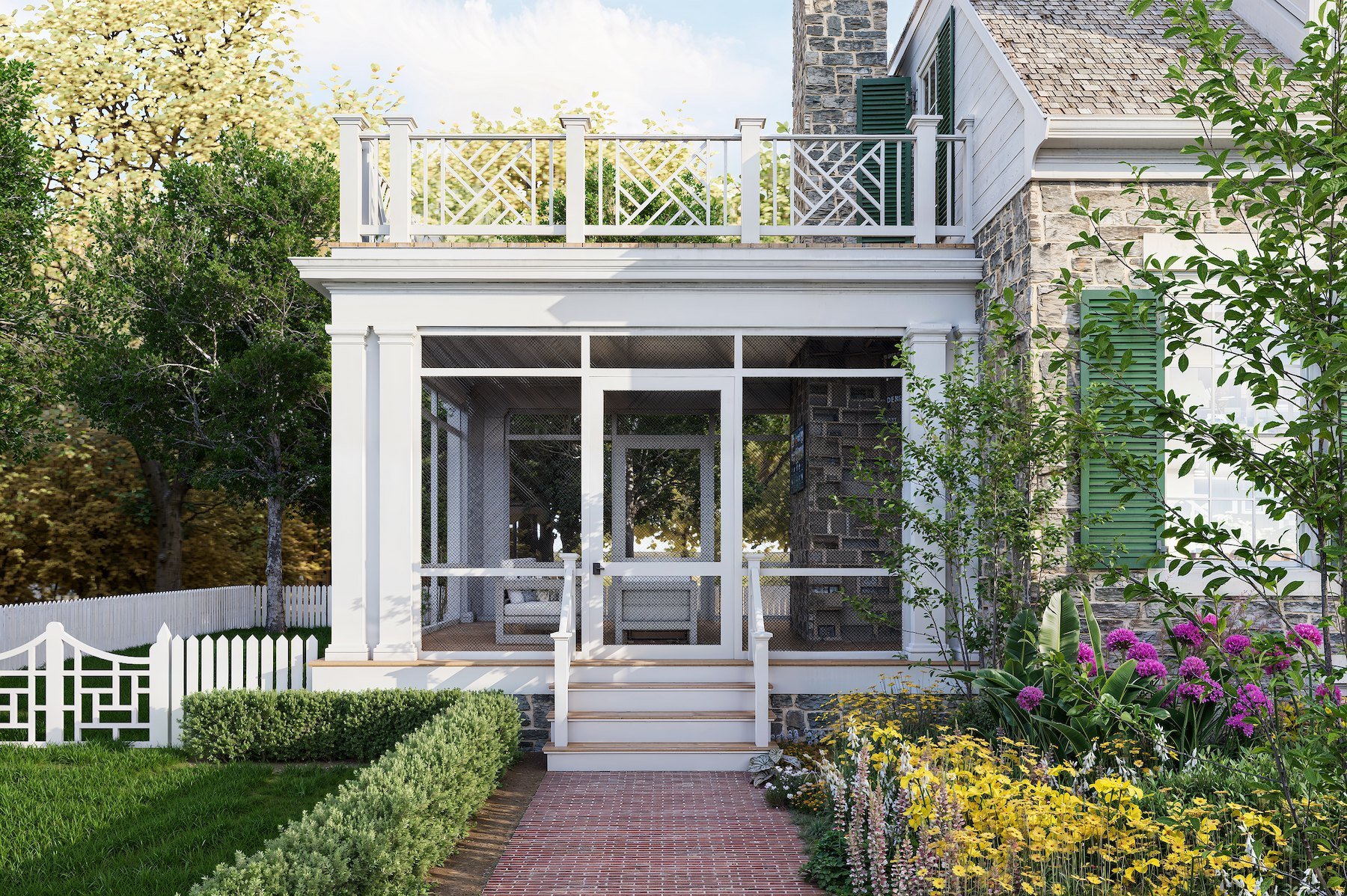 Front porch with a screened-in area, white wooden steps, and railing, surrounded by green bushes and colorful flowers, with a stone house on the right and trees in the background.