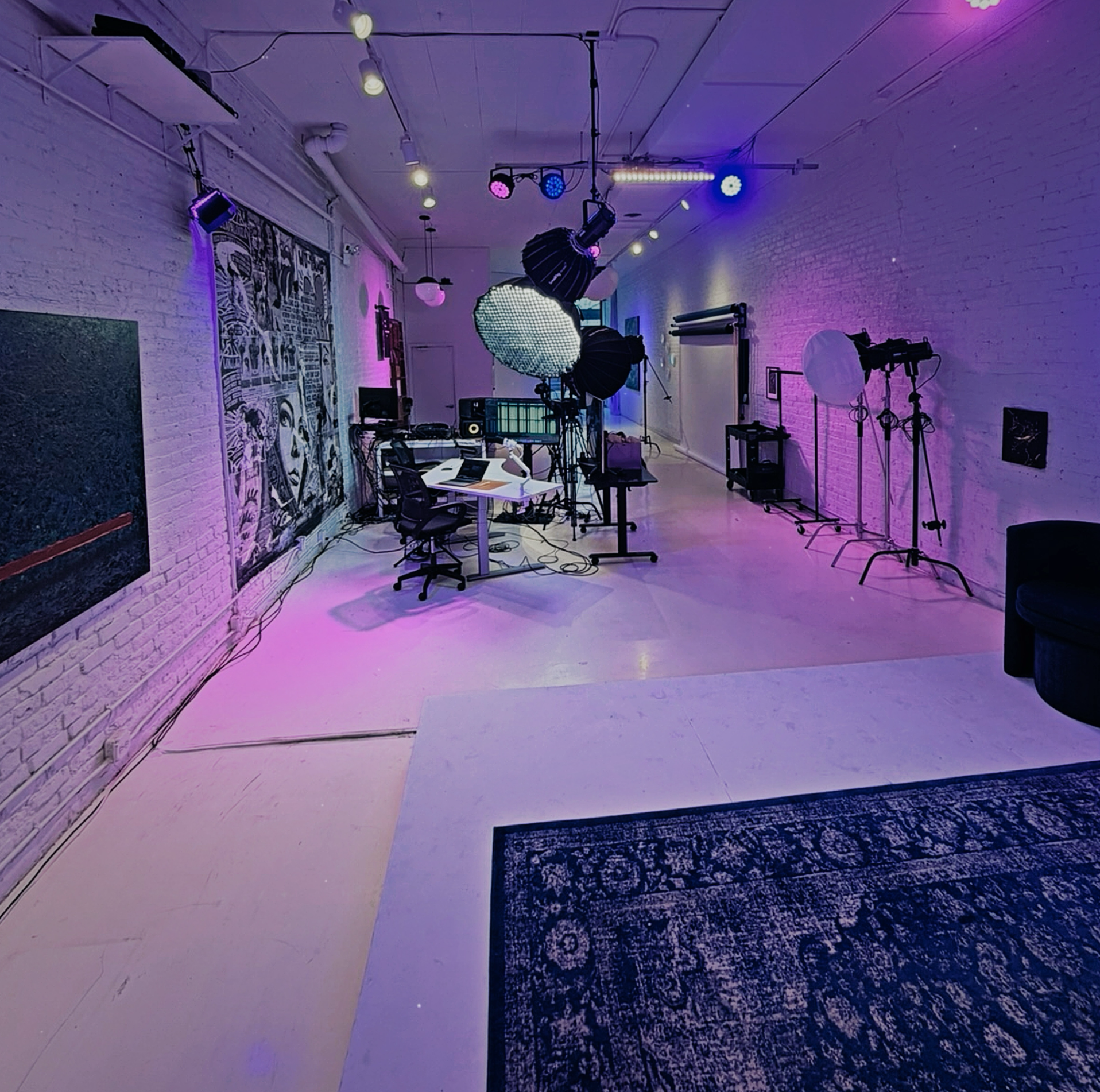 Photography studio setup at XYZ Studios Chicago with professional lighting, workstation, and creative decor inside the River North content studio.