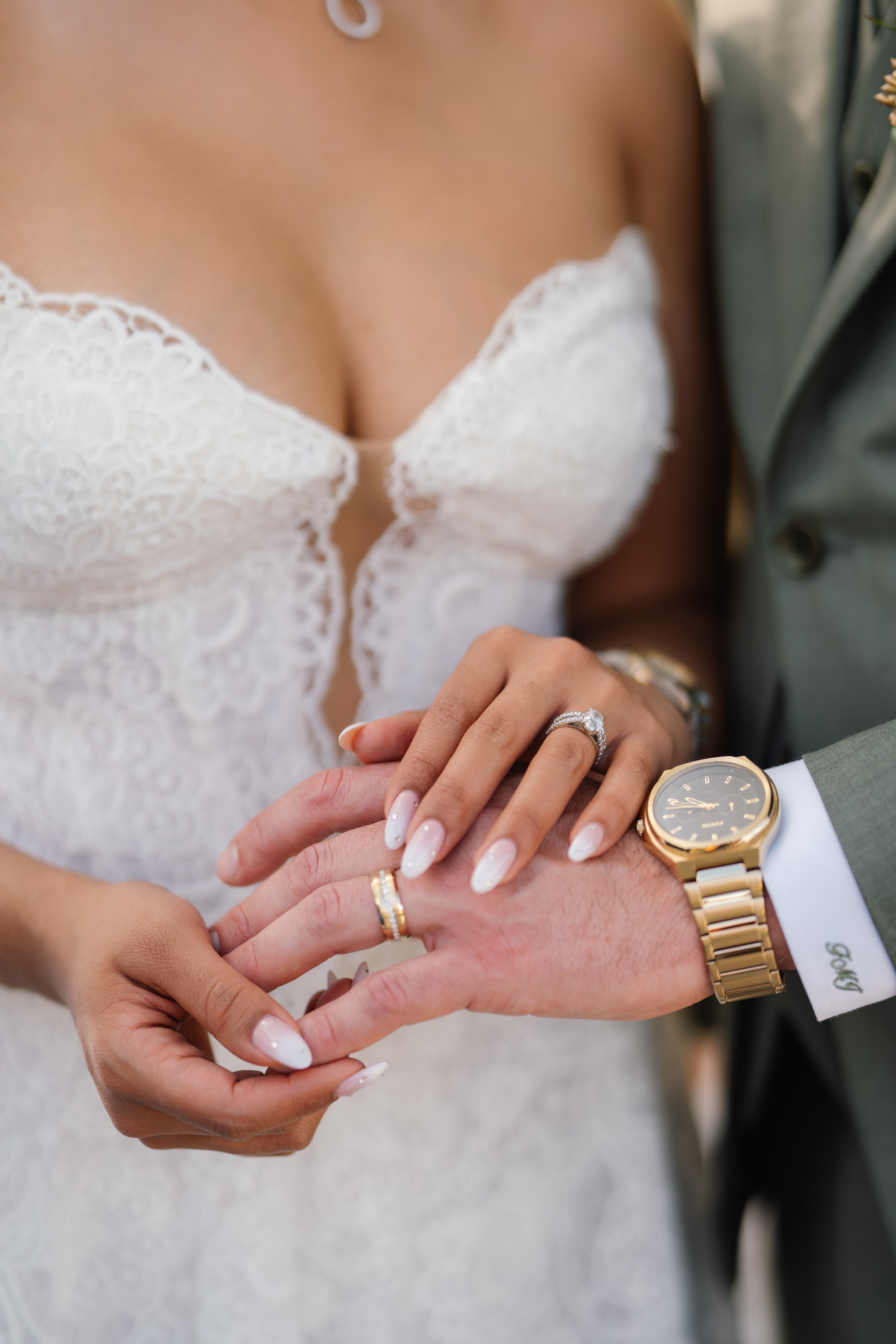 Close-up of bride and groom hands showing wedding rings during South Florida ceremony