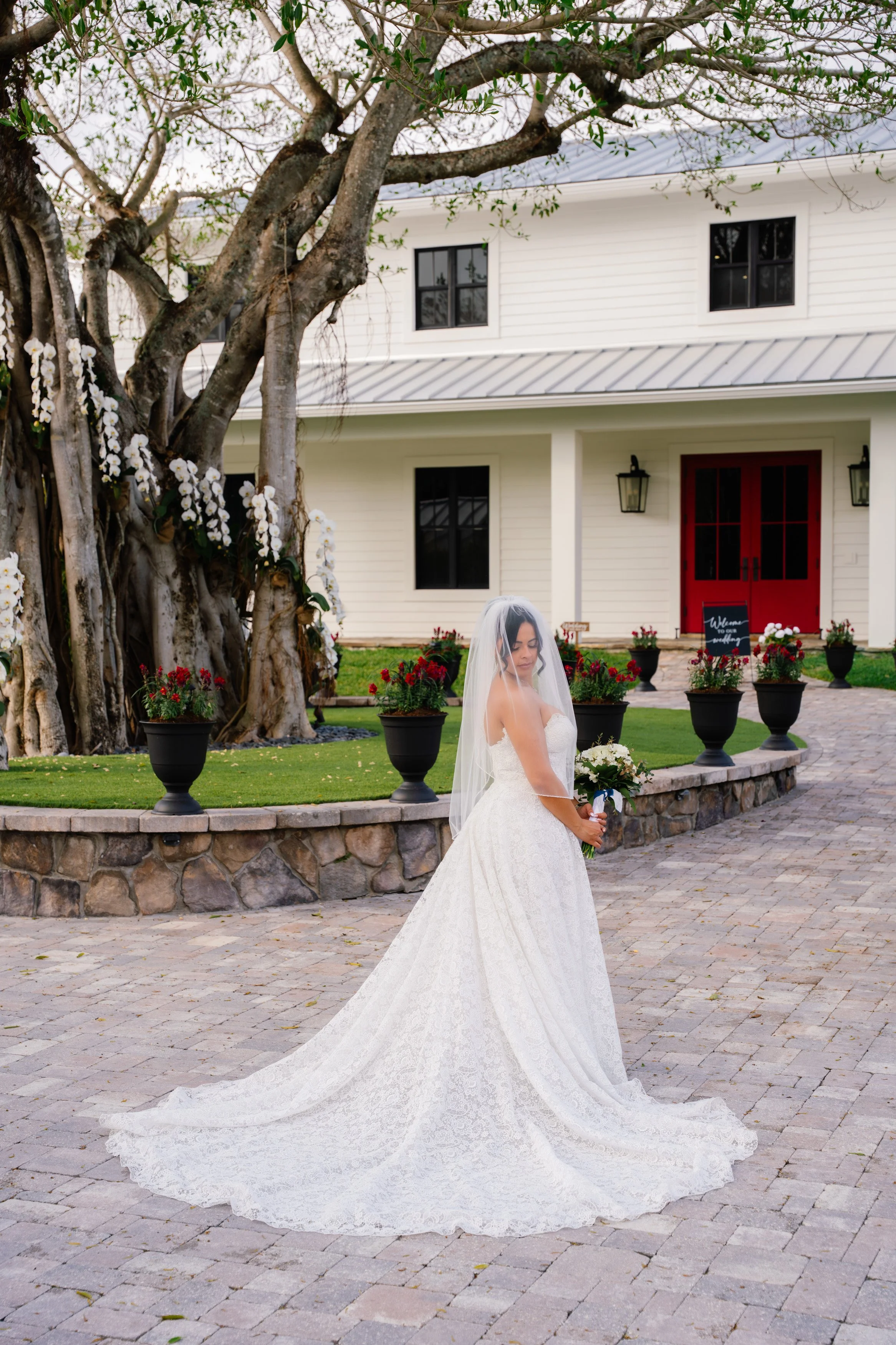 Bride and groom walking together outside wedding venue during South Florida wedding day