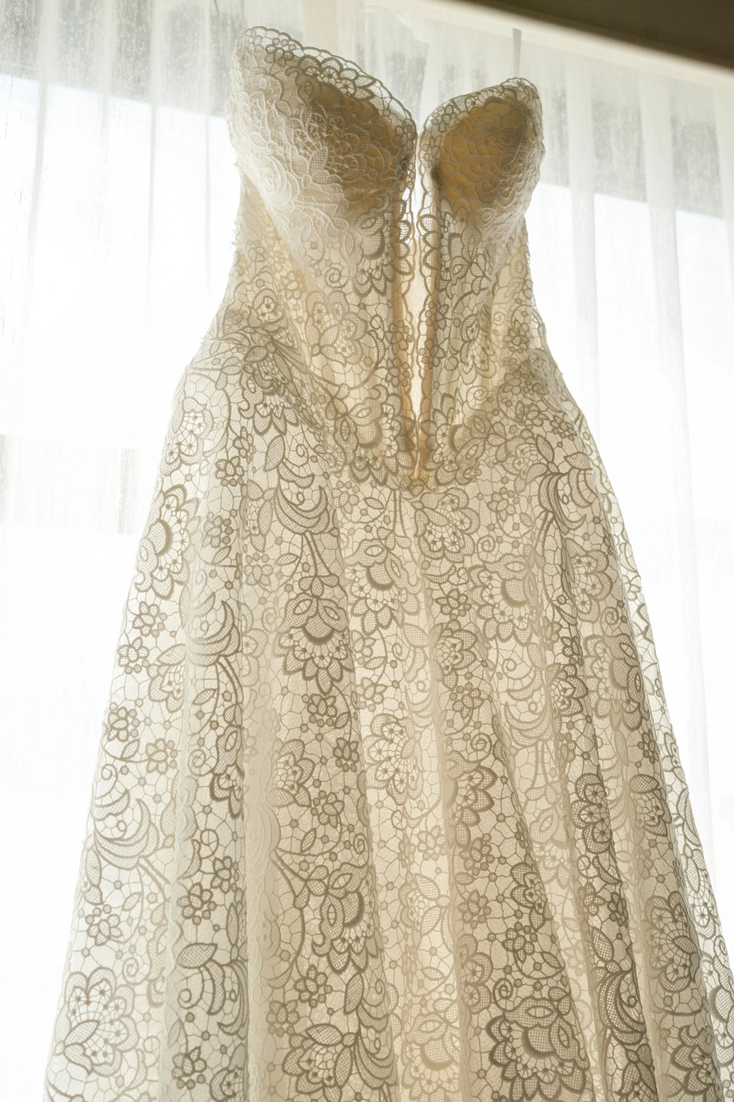 Wedding dress detail shot with lace and elegant bridal styling at South Florida wedding