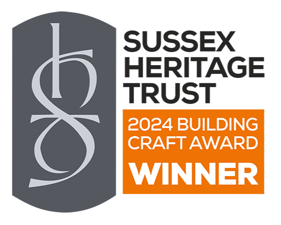 Award badge displaying the text "2024 Building Craft Award Winner" with a gray background and stylized gray logo.