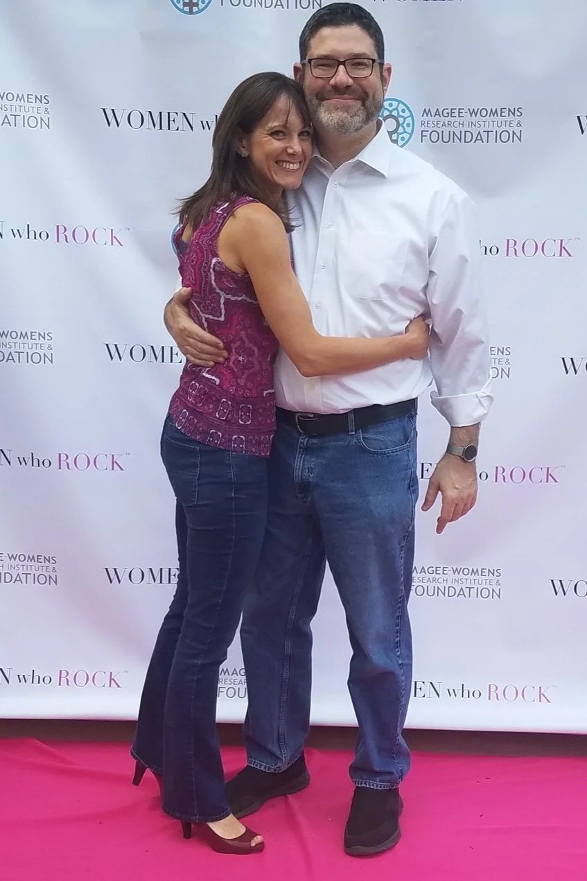Rebecca and her husband Scot MacTaggart on the "pink carpet" of the Women Who Rock benefit concert, benefitting women's reproductive health.