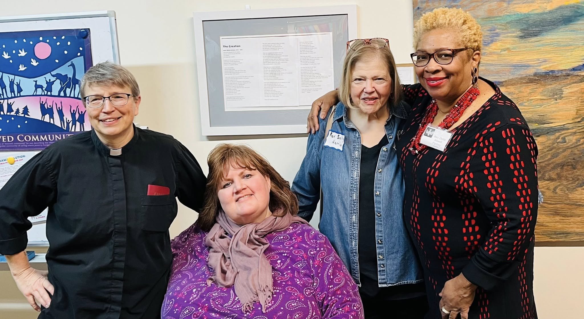 a group of people standing together and smiling