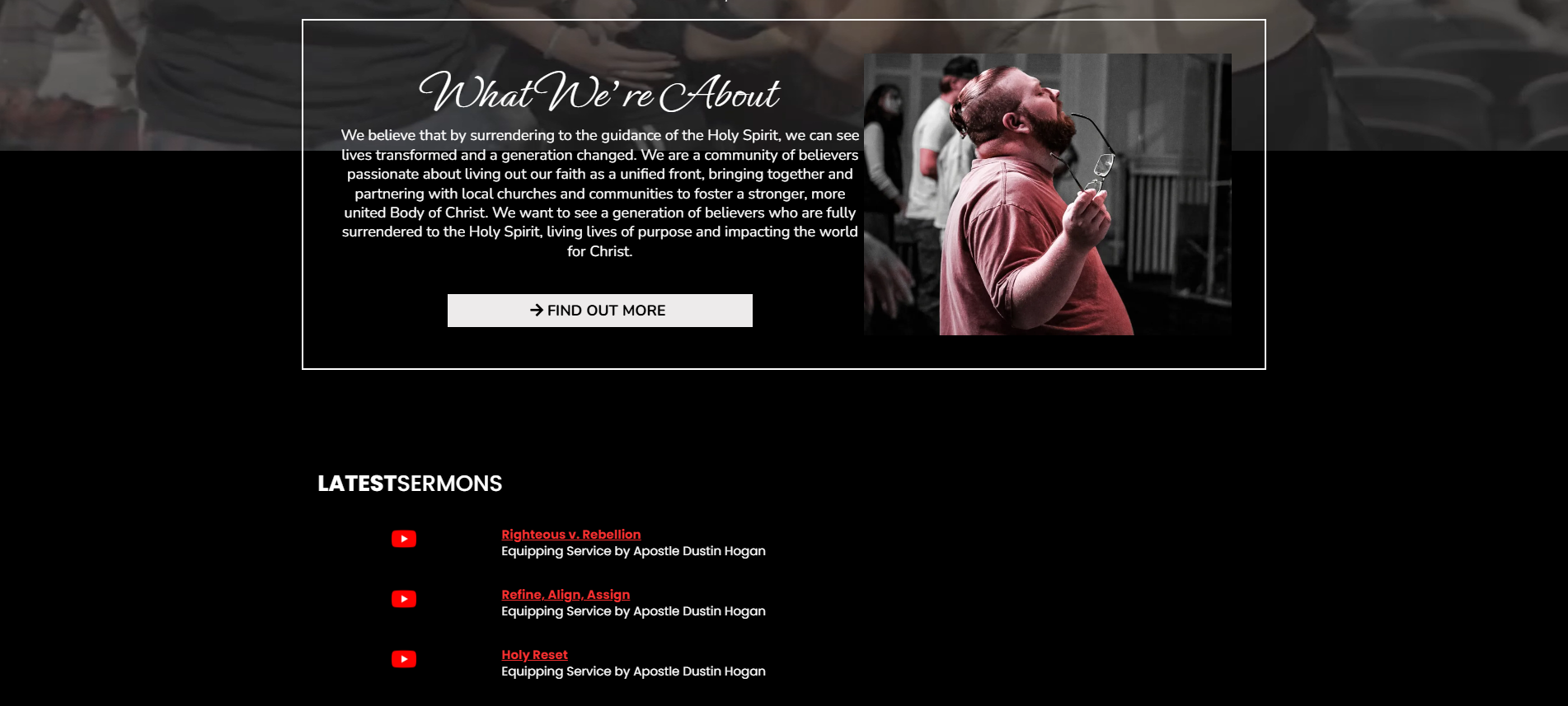 Church website homepage featuring a section titled 'What We're About' with a paragraph about faith and community, a 'Find Out More' button, and a video thumbnail showing a man with a beard and glasses holding glasses and with eyes closed, praying or 