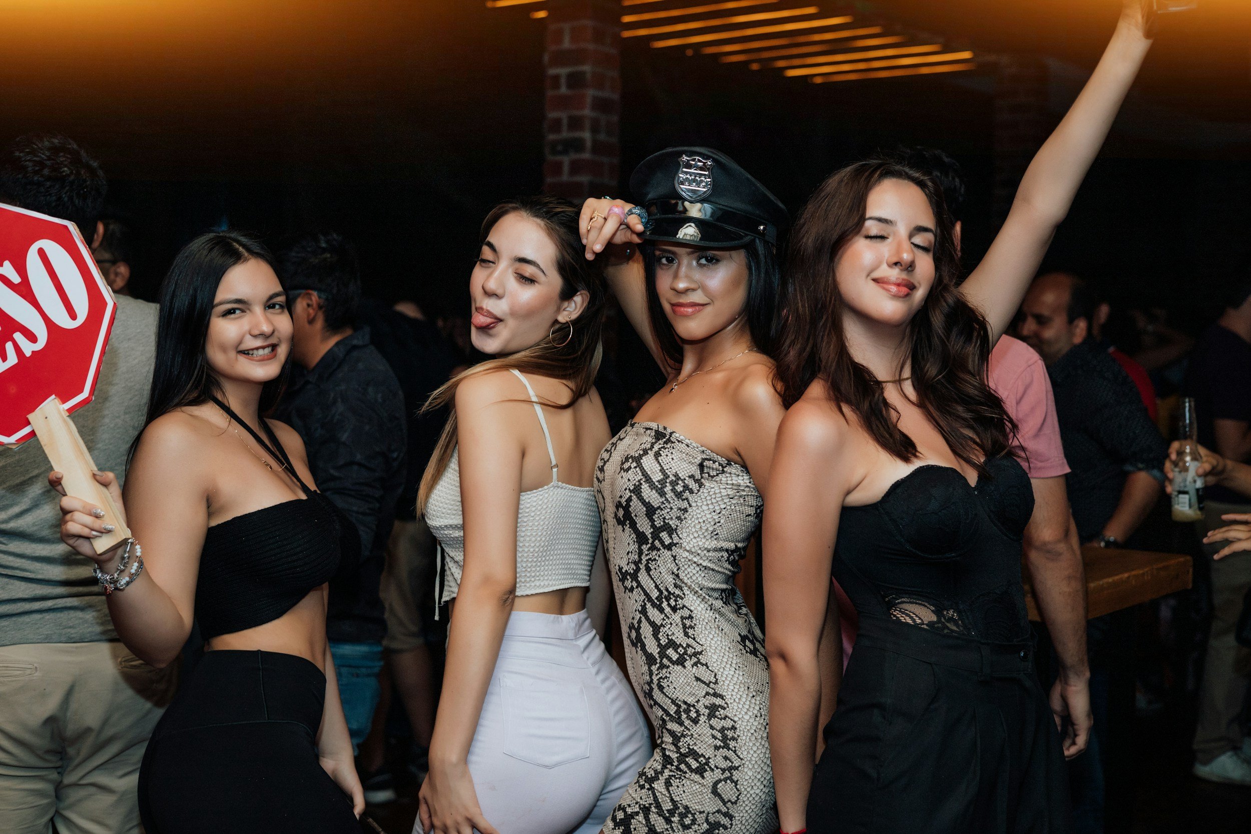 Group of friends celebrating and having fun at a bespoke private villa party and DJ event in Mallorca.