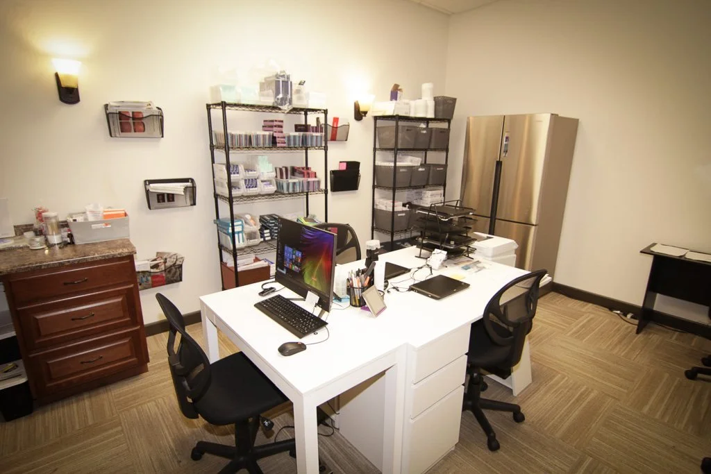 Staff office with white desks