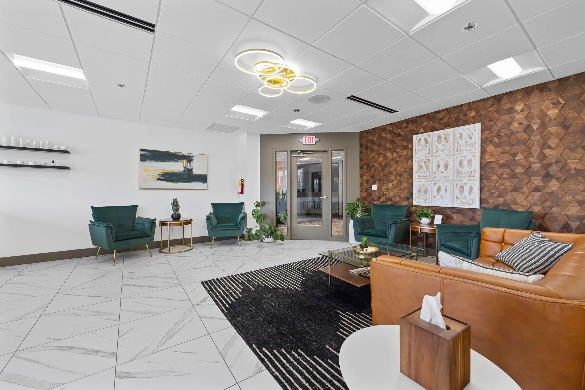 Lounge seating area with large-format tile floors