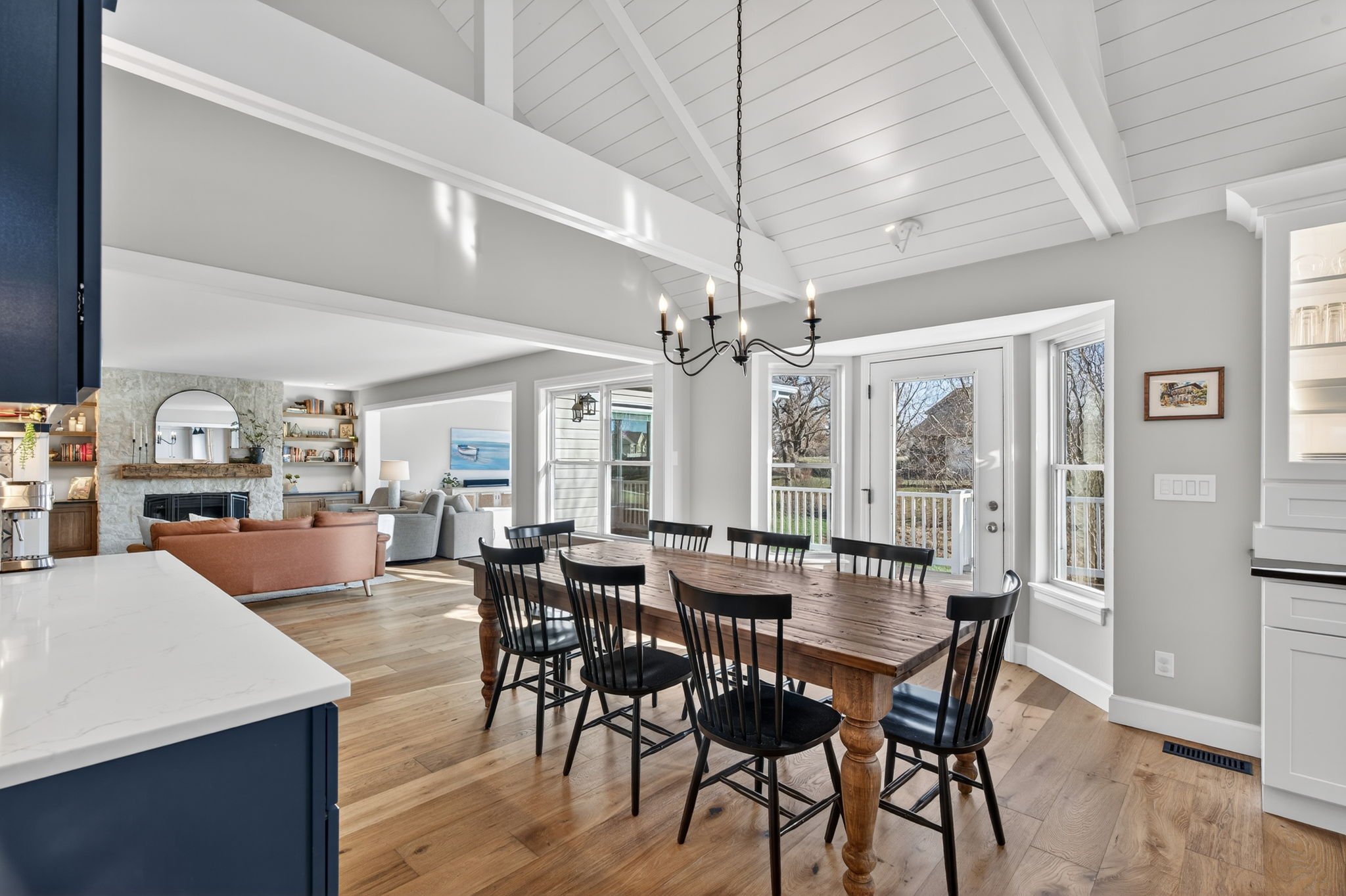 Dining area with a chandelier and views to the family room