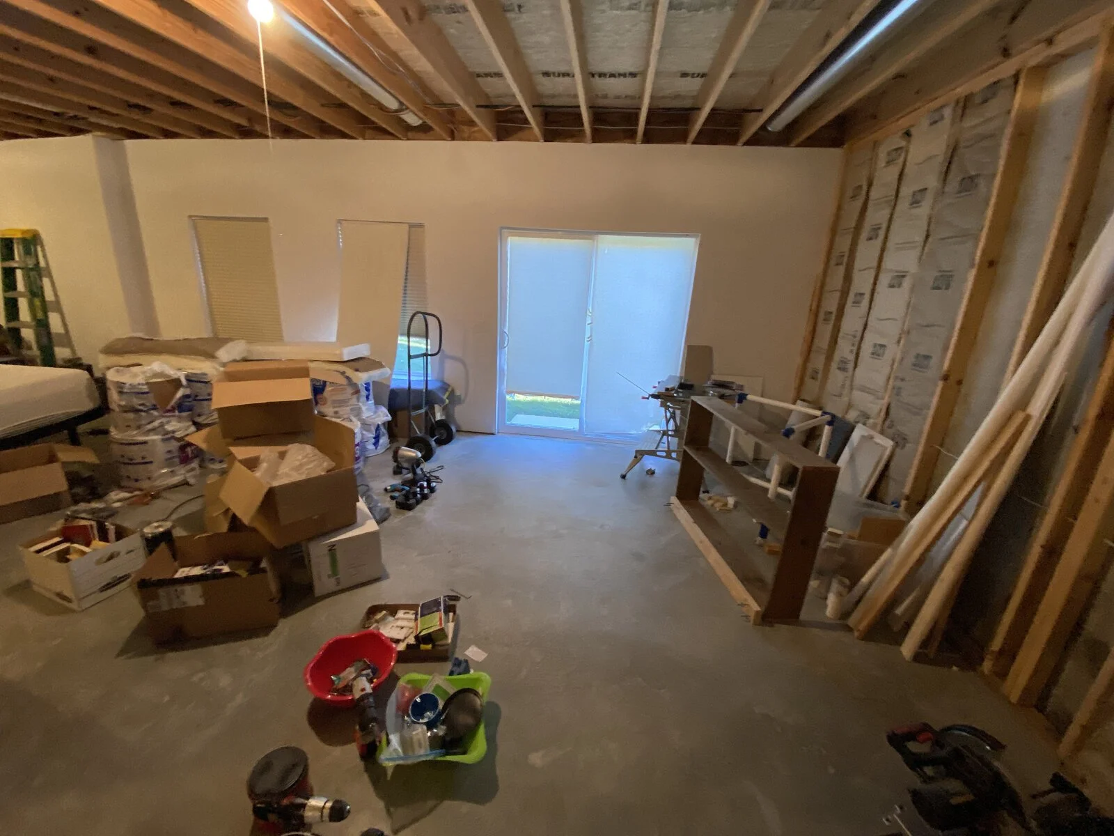 Before: bare walls by the walkout door