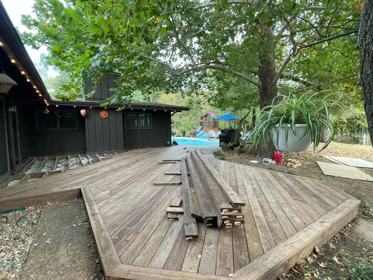 Angled wood deck with a planter