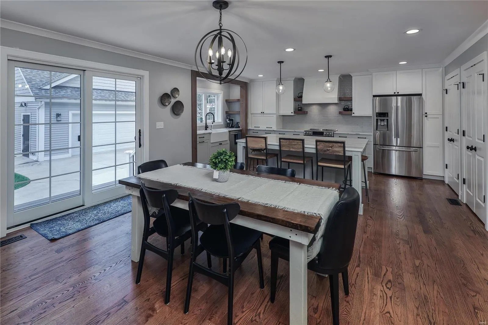 Dining area beside sliding patio doors