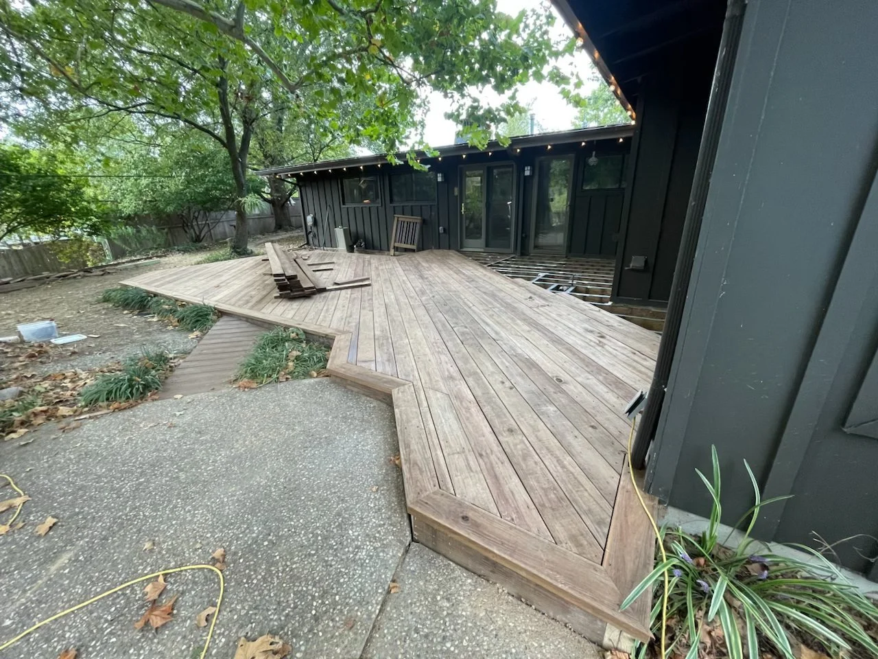 Wood deck along the back of the house