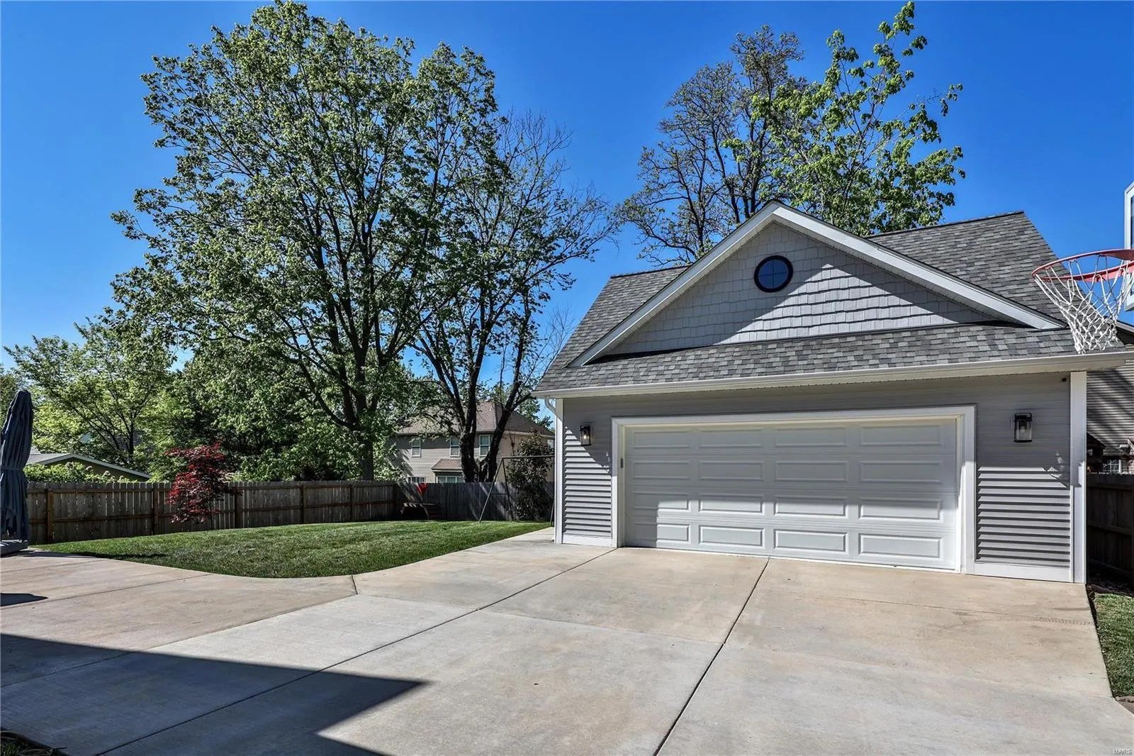 Detached garage with matching siding