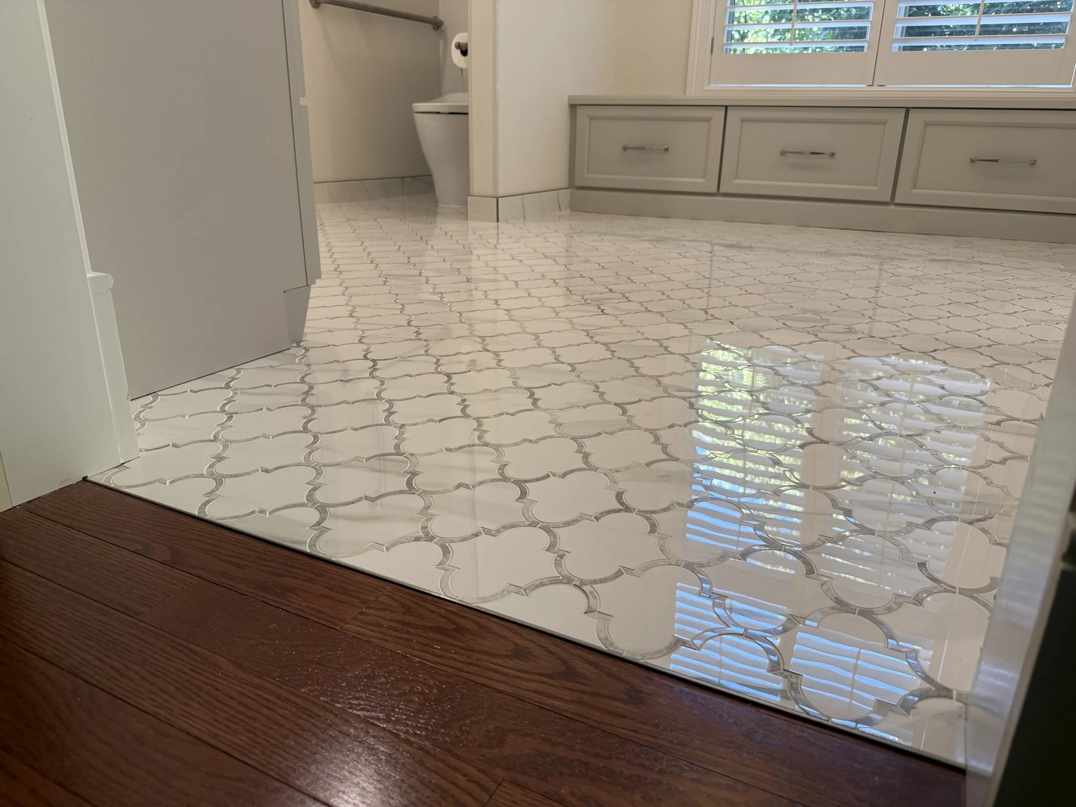Polished arabesque mosaic tile floor