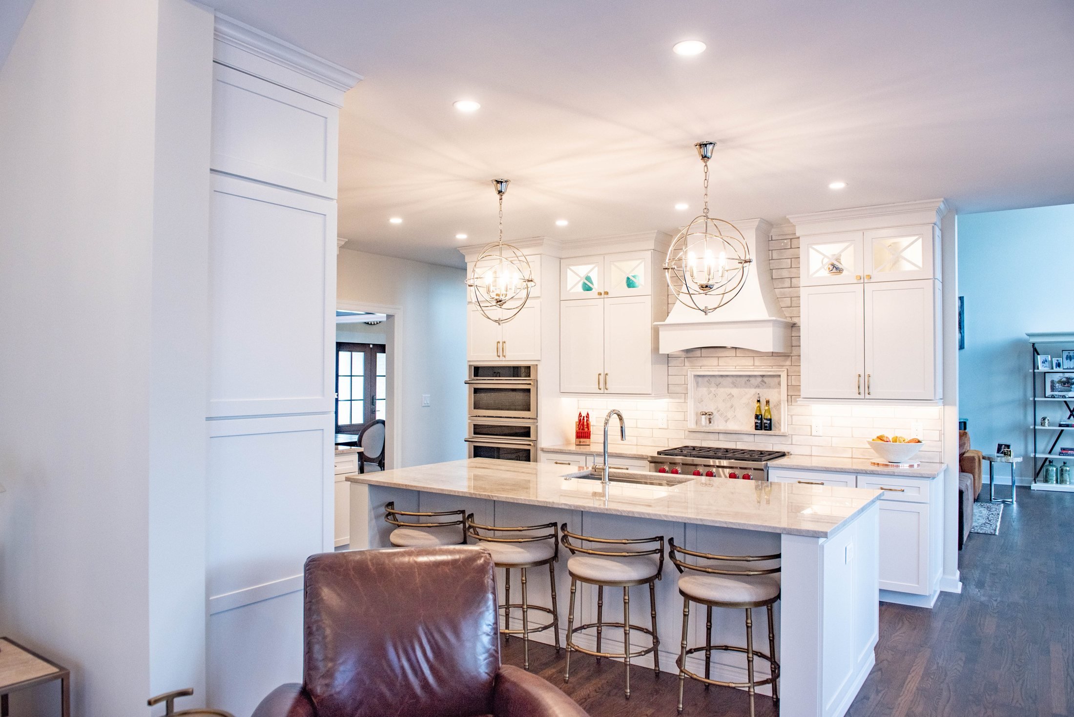 White kitchen viewed from the family room