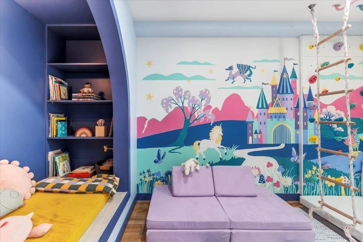 Reading nook beside a castle mural