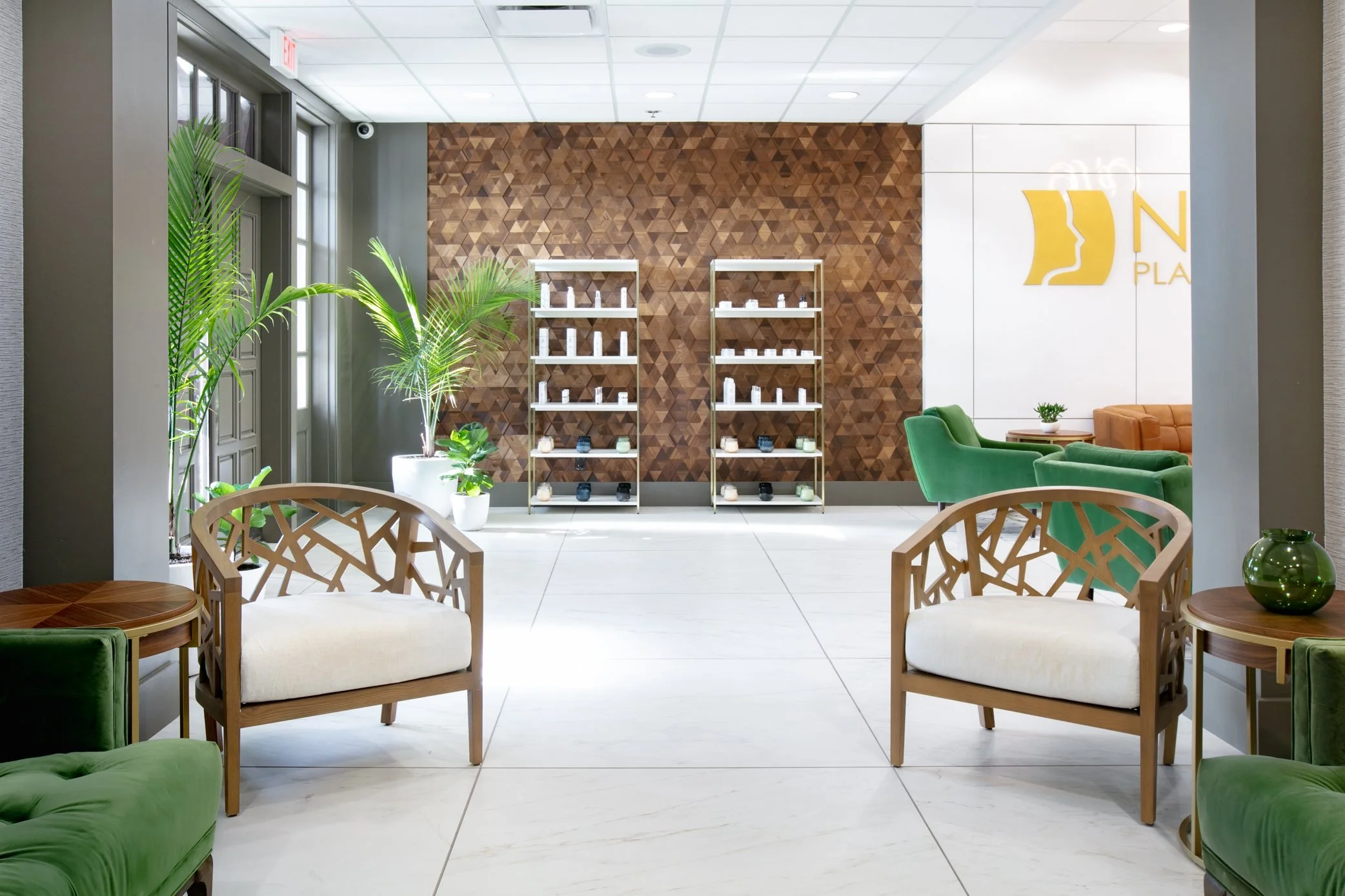 Waiting area with a wood feature wall and product shelving