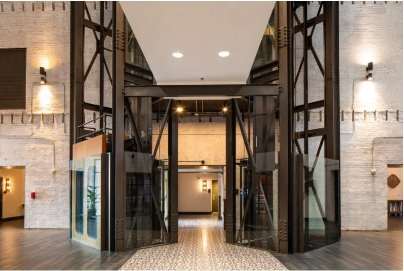 Elevator hall with exposed steel framing