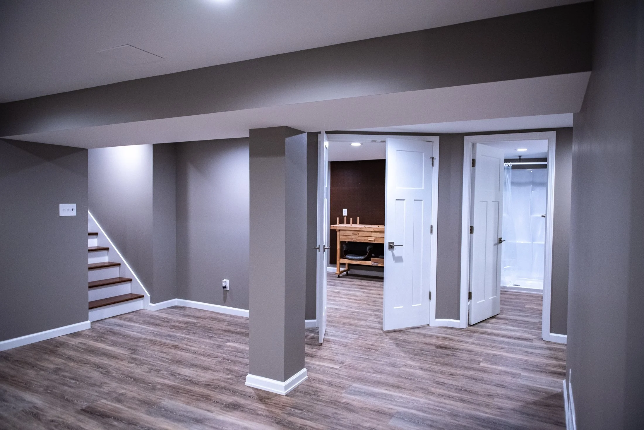 Finished basement with stairs and open living space
