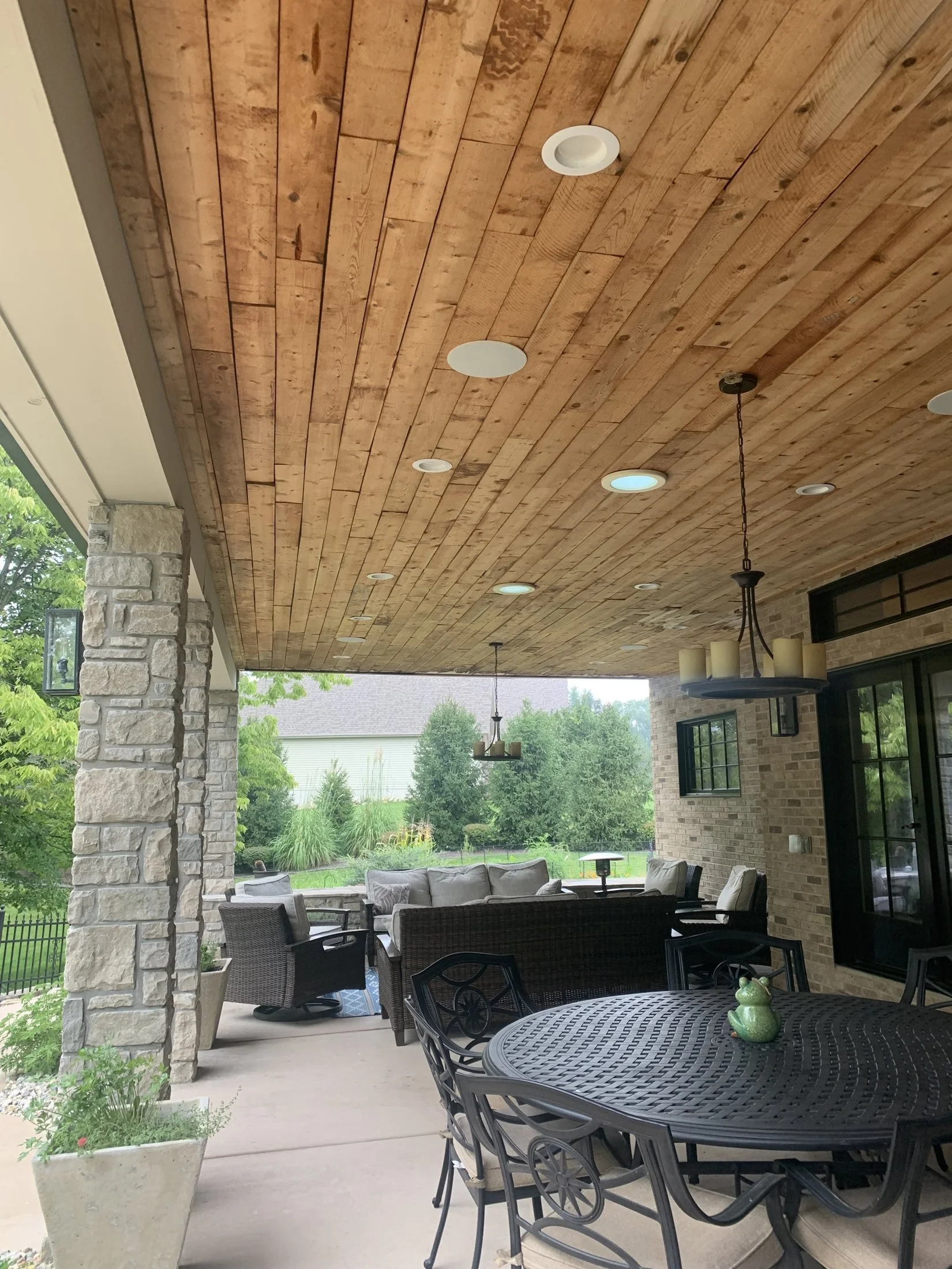 Outdoor dining under a covered patio