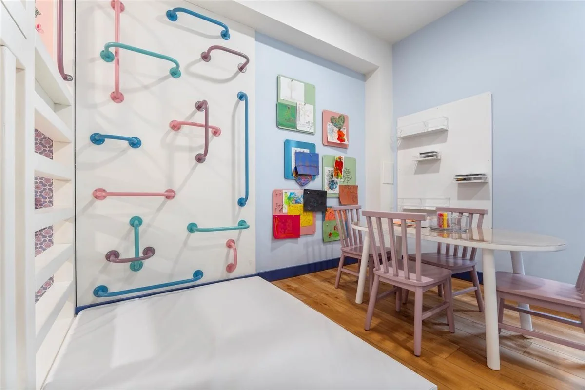 Play wall with a table and chairs