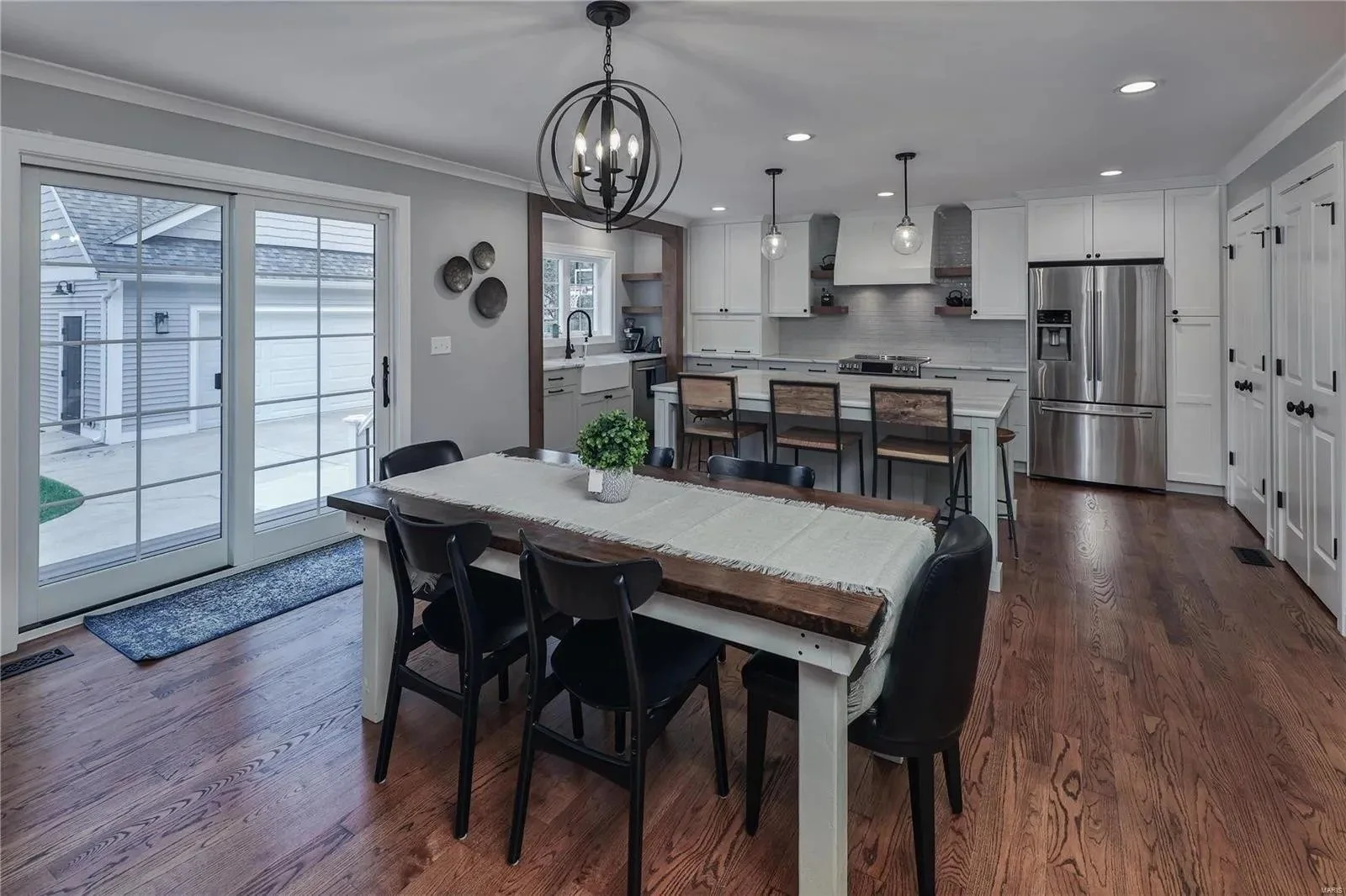 Dining area beside sliding patio doors