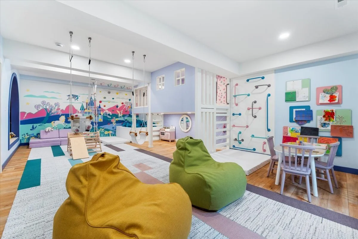 Open playroom with bean bag seating
