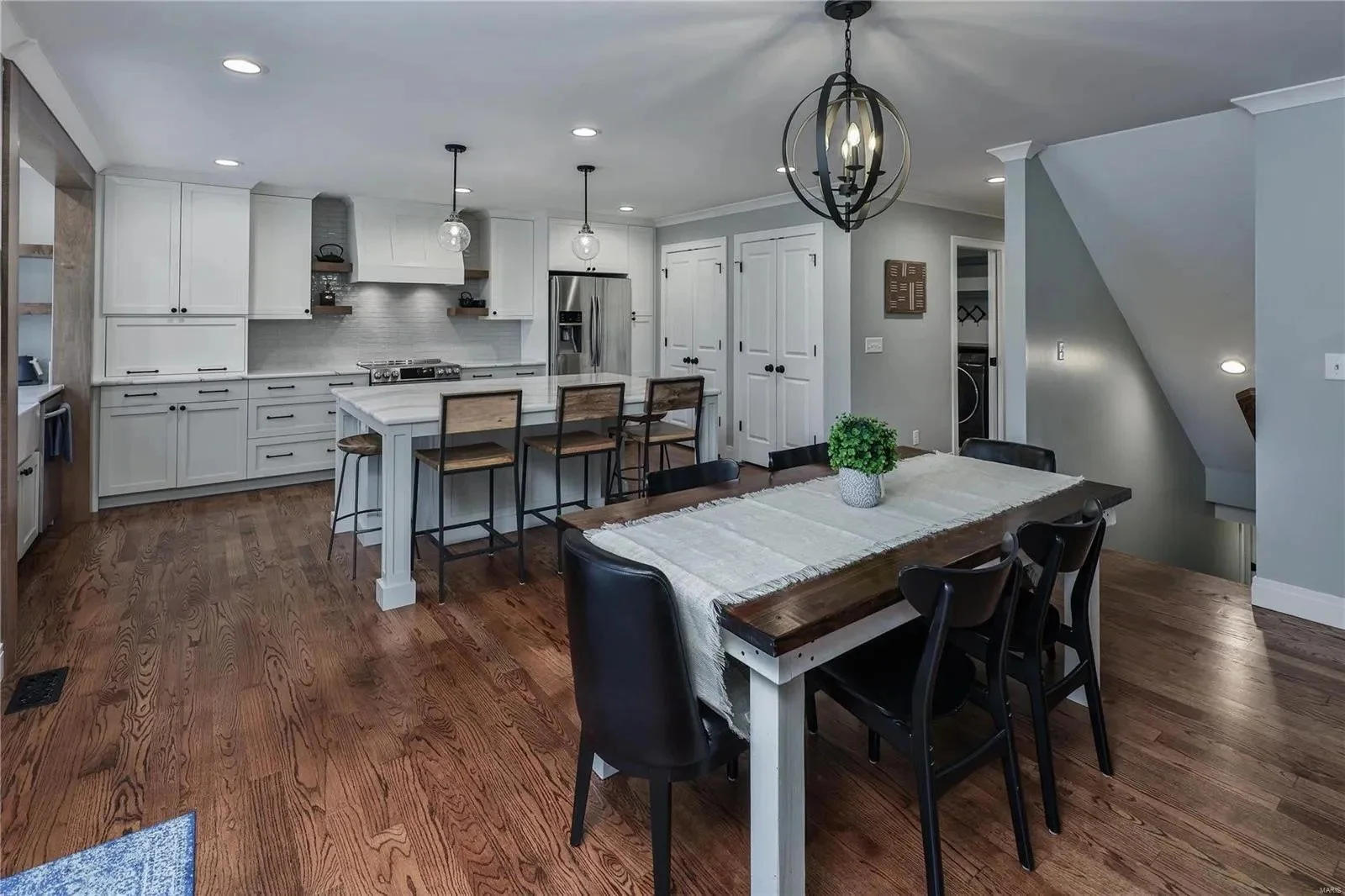 Dining table beside the kitchen island